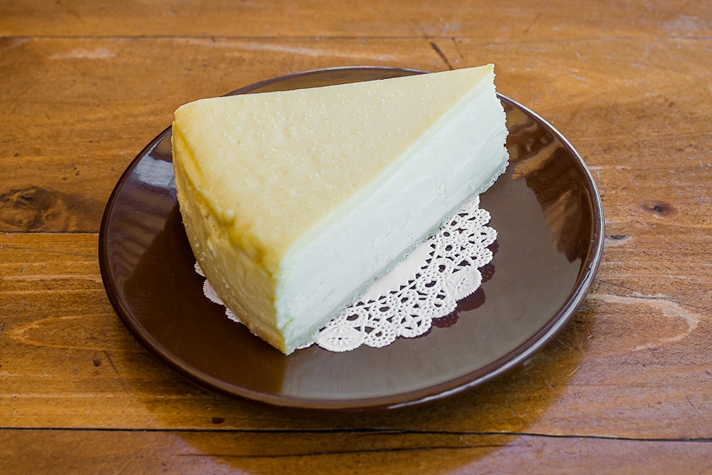 Order Cheesecake  food online from Cinderella Bakery & Cafe store, San Francisco on bringmethat.com