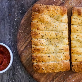 Order Bread Sticks - 16 Pieces food online from Fox's Pizza Den store, Port Allegany on bringmethat.com