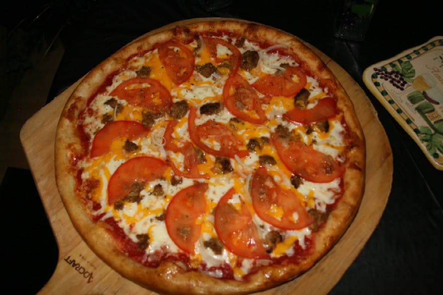 Order Chopped Beef & Cheddar Pizza - Medium 14" food online from The Dough Boy's Pizzeria store, Baldwinsville on bringmethat.com
