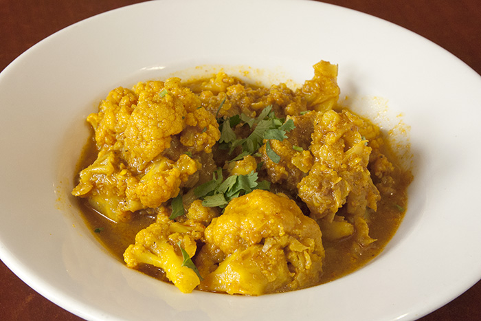 Order Gobhi Chicken Curry food online from Roti Roll store, San Francisco on bringmethat.com