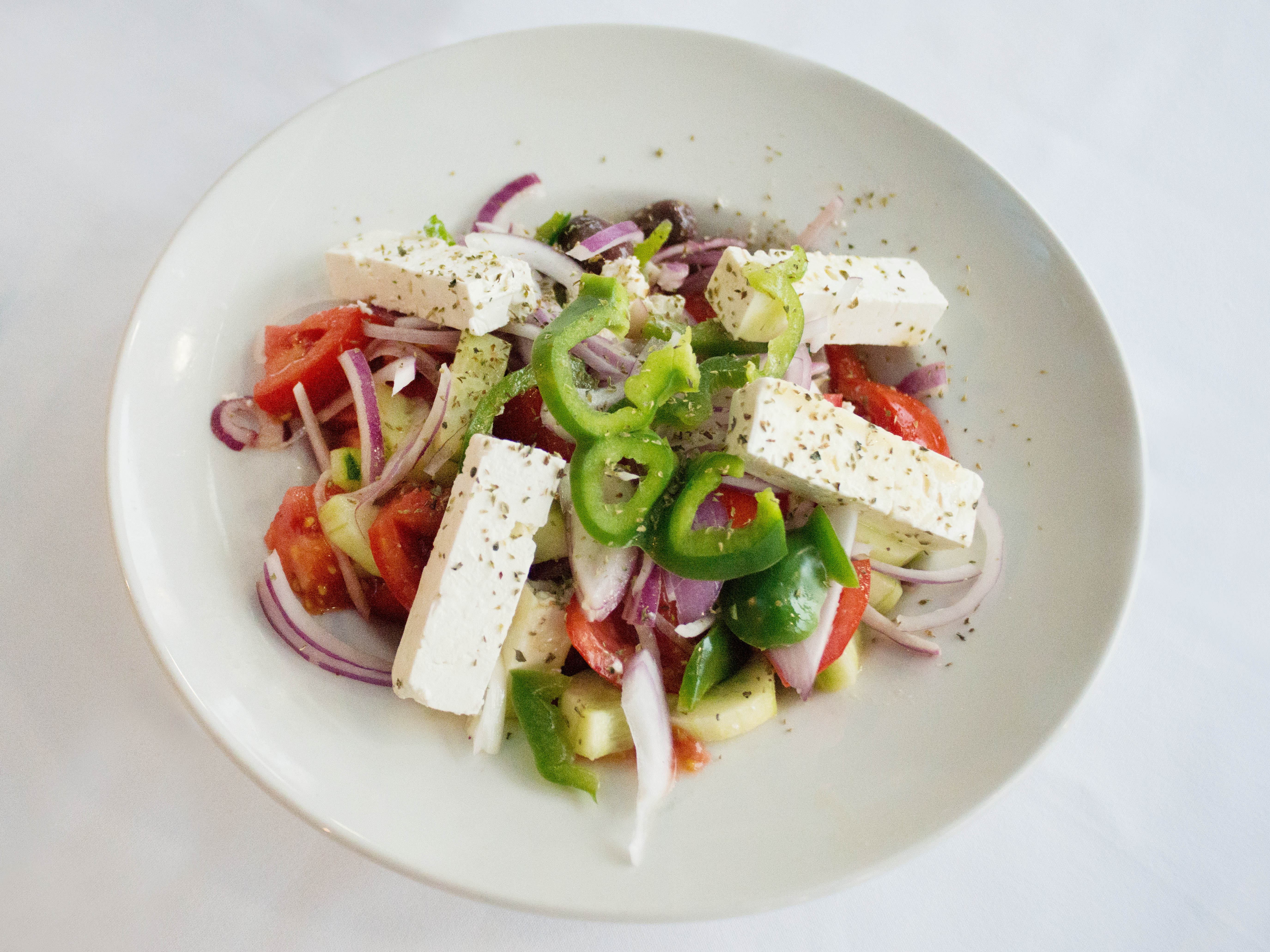 Order Greek Village Salad food online from Mykonos Restaurant store, Niles on bringmethat.com