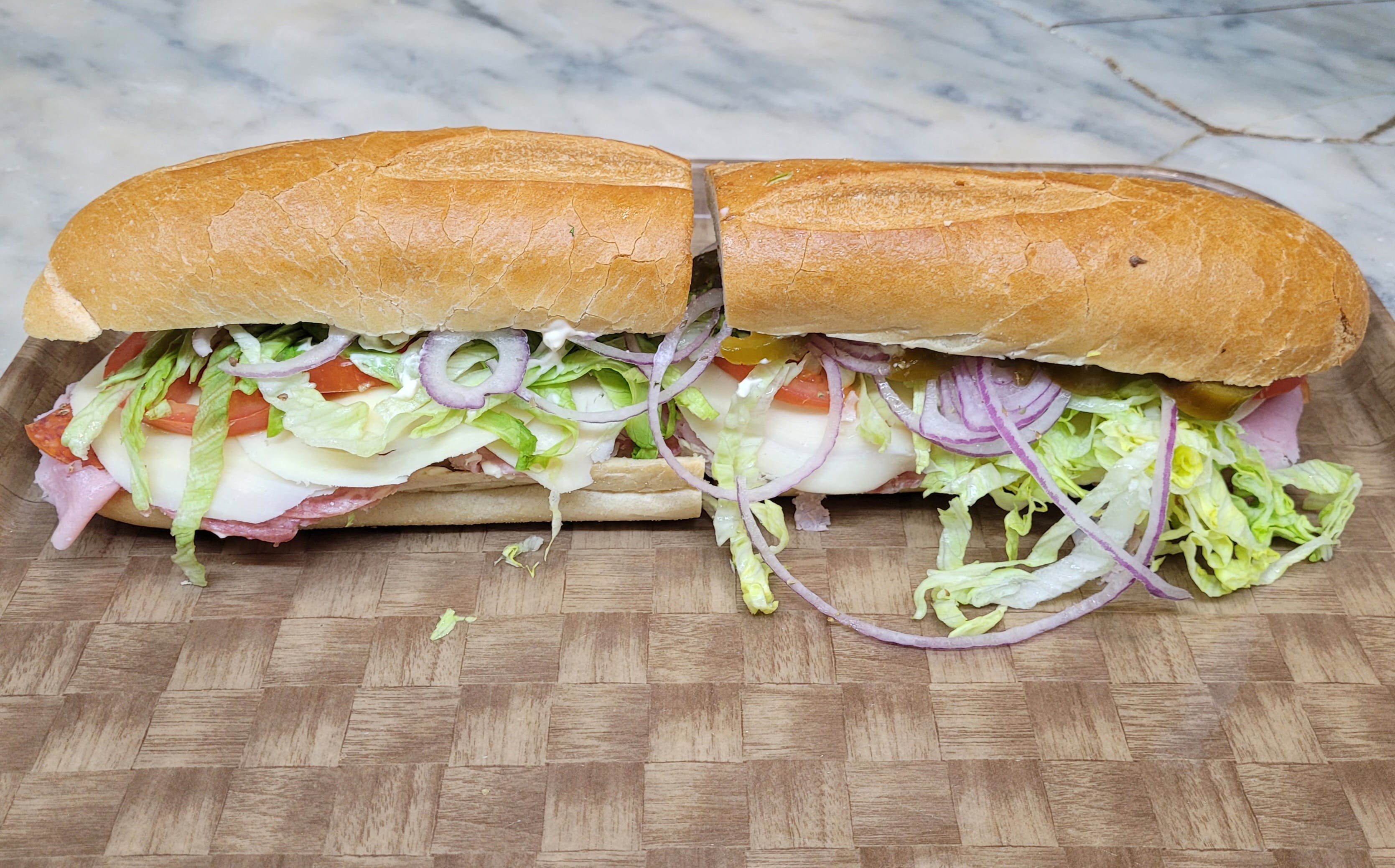 Order Ham, Salami, Turkey & Provolone Sub - Cold Subs food online from Rhythm And Spice Pizzeria And Grill store, New Brunswick on bringmethat.com