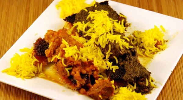 Order Tah-Deeg with 2 Stews food online from Safir Mediterranean Cuisine store, Woodland Hills on bringmethat.com