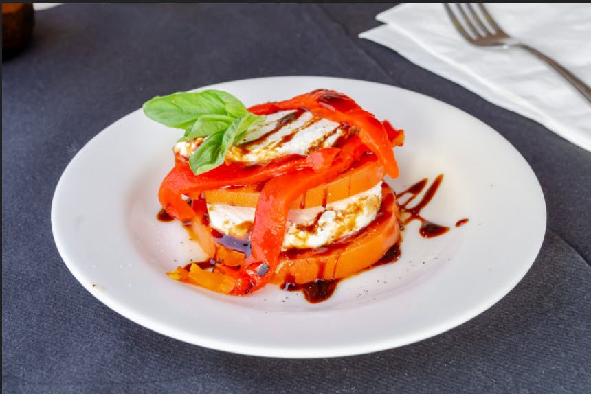 Order Fresh Mozzarella Cheese, Tomatoes & Roasted Peppers - Appetizer food online from Vinnie's Pizzeria Ristorante store, Boonton on bringmethat.com