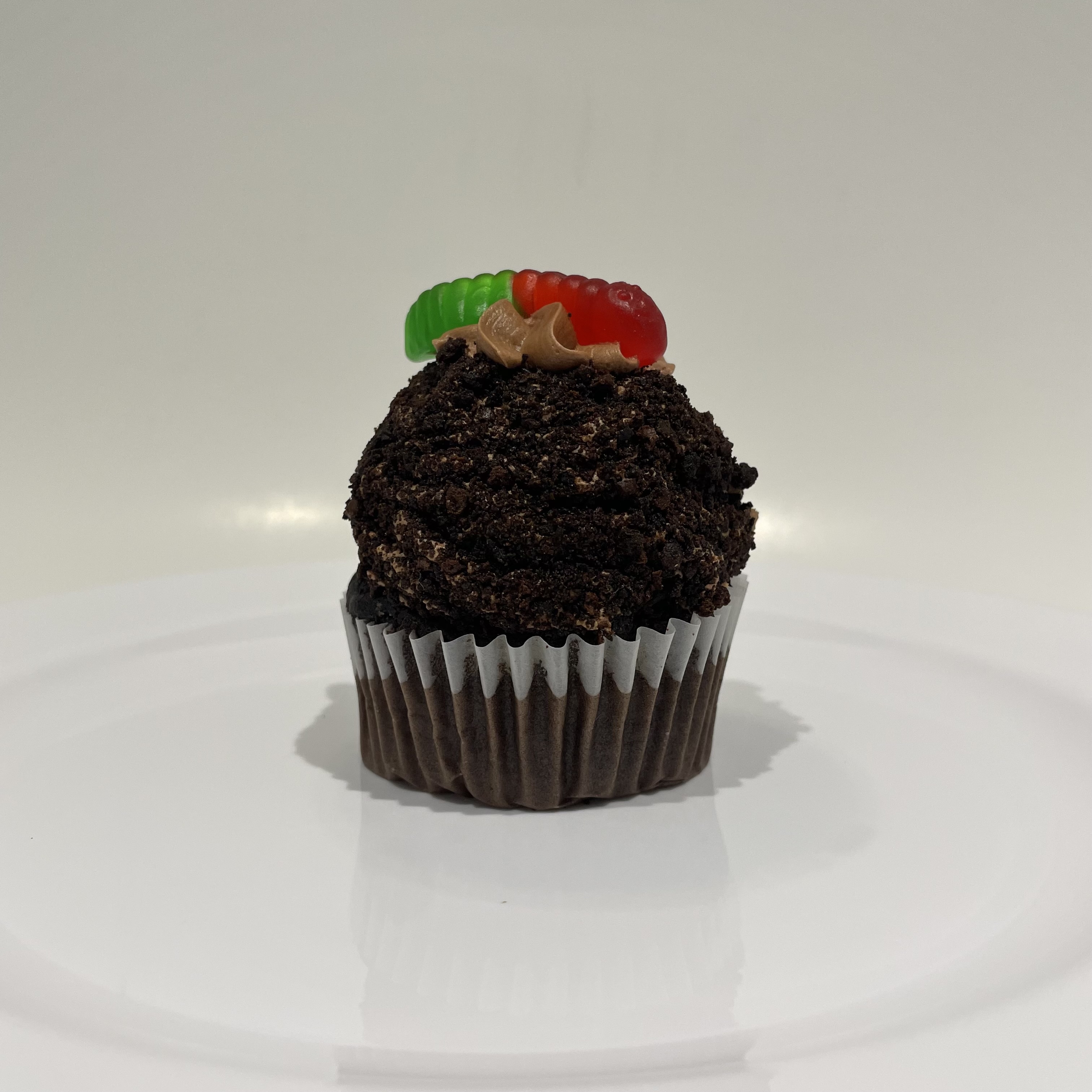 Order Worms in Dirt Cupcake food online from The House of Cupcakes store, Princeton on bringmethat.com