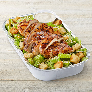 Order Caesar Salad With Chicken Party Tray food online from Tgi Fridays store, Fredericksburg on bringmethat.com