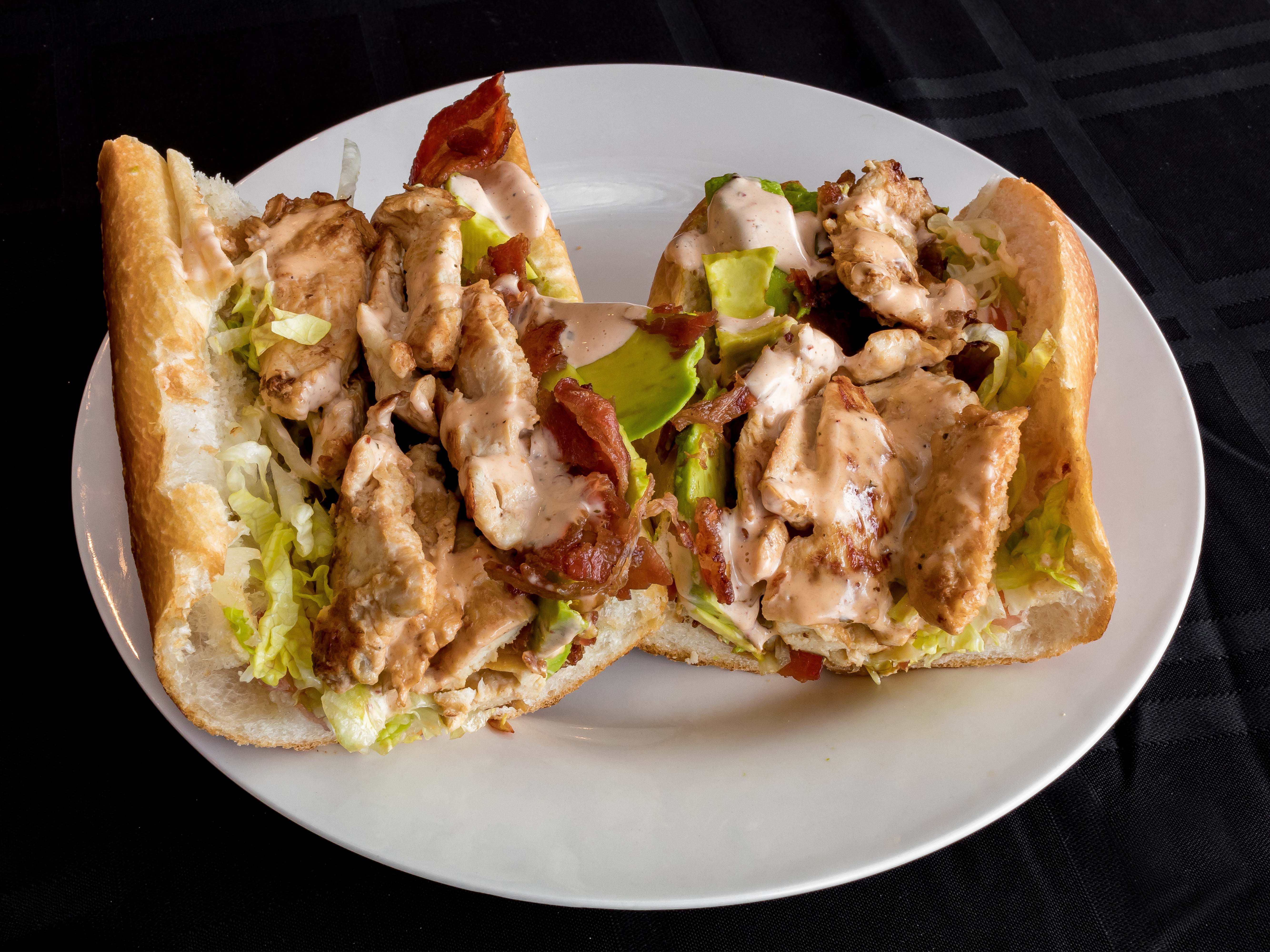 Order Avocado Chicken Sandwich food online from Uncle Oogies store, Philadelphia on bringmethat.com