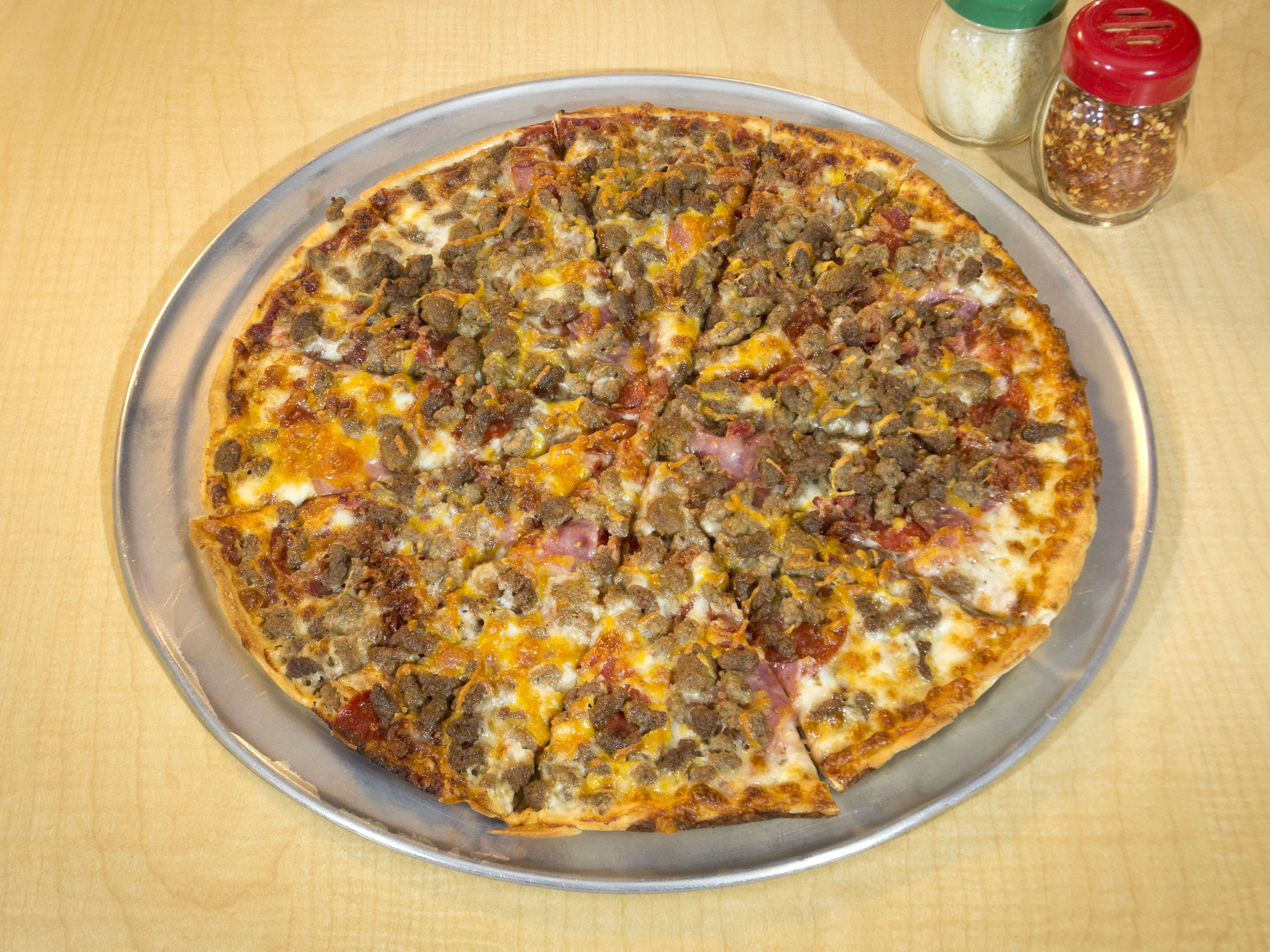 Order Meat Lover Original Thin Crust Pizza food online from Smitty Pizza store, Shreveport on bringmethat.com