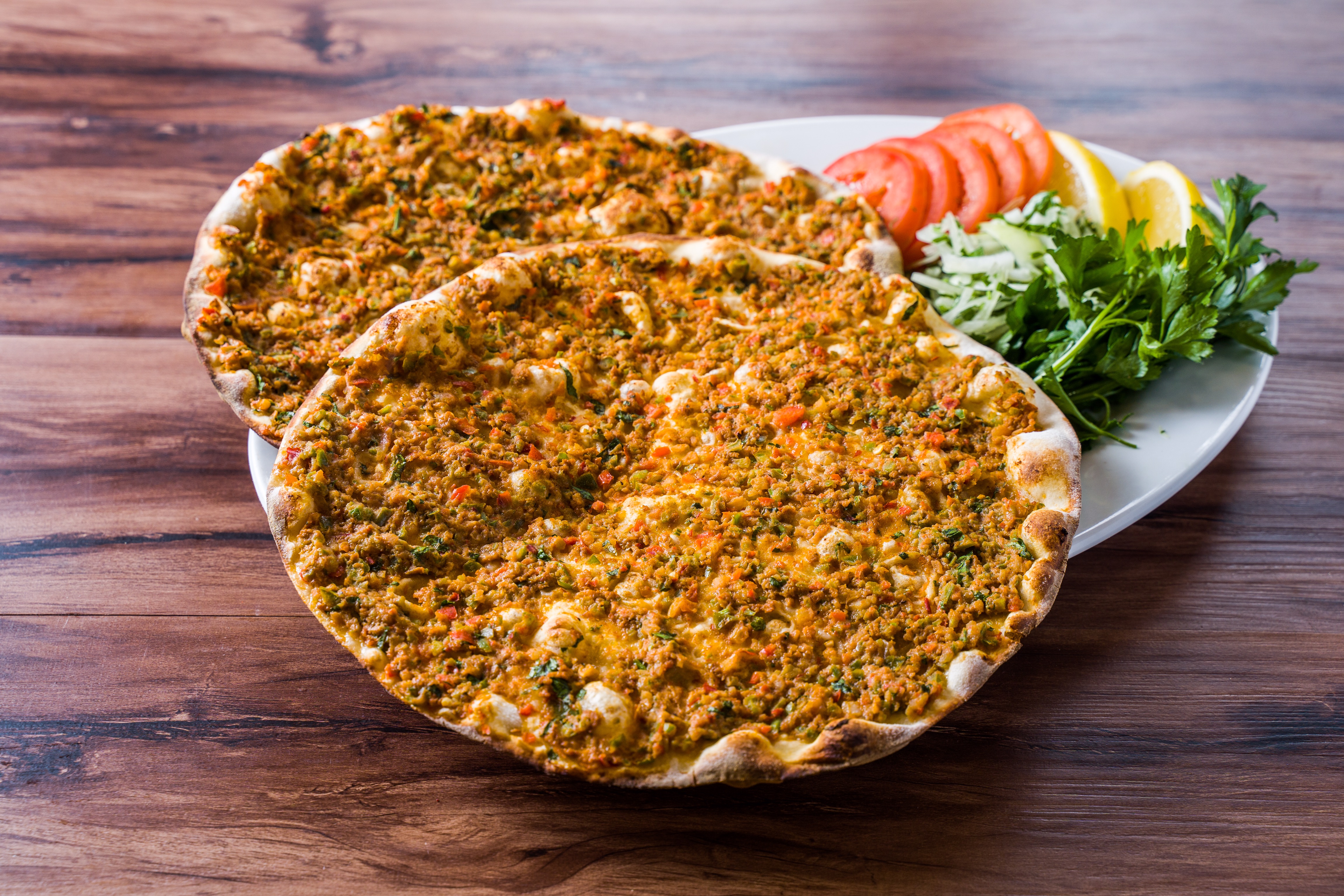 Order Lahmacun food online from Sophra Grill store, New York on bringmethat.com