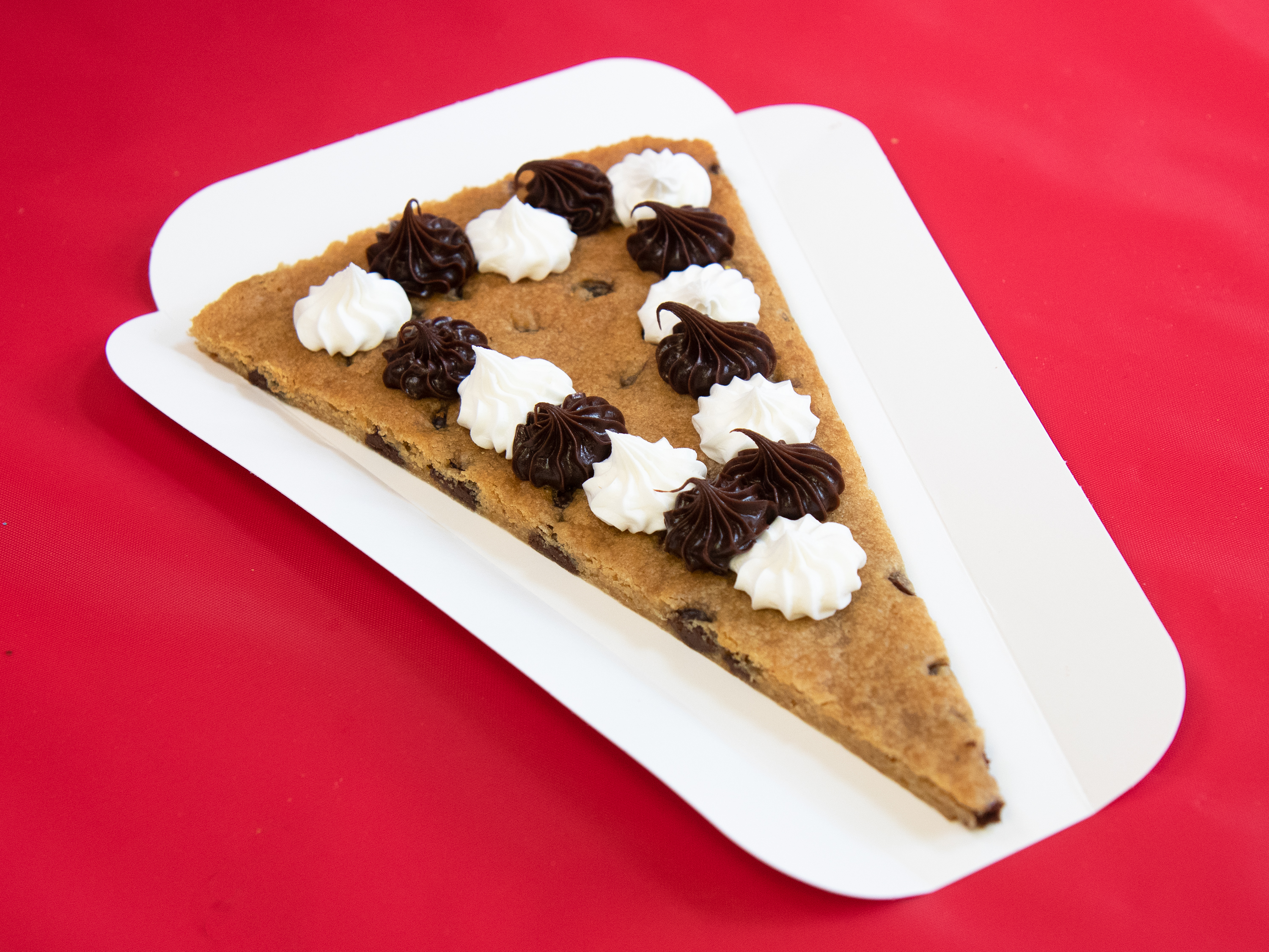 Order Cookie Cake By-The-Slice food online from Great American Cookies store, Clarksville on bringmethat.com