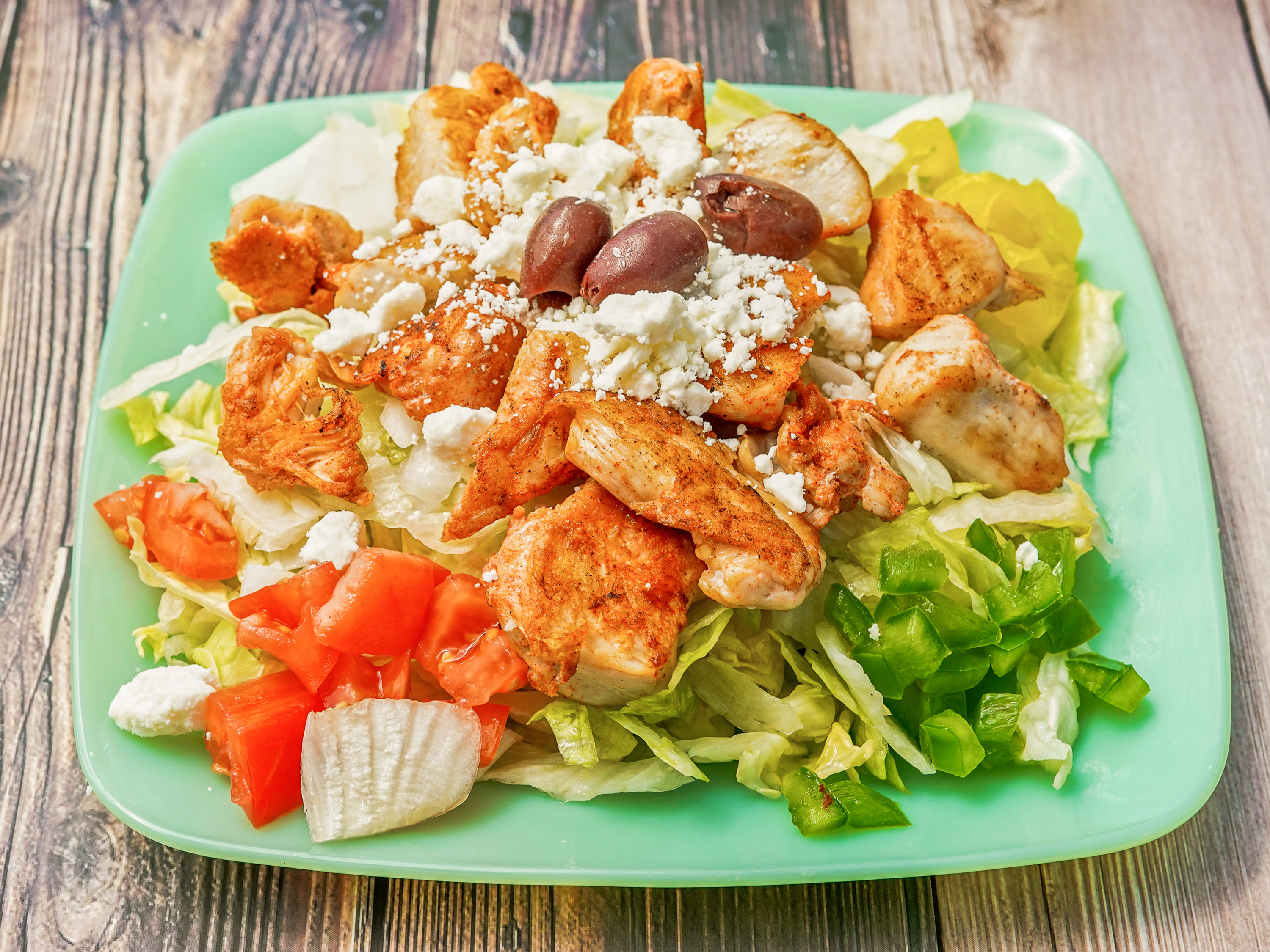 Order Greek Salad food online from Mikey Kitchen store, Elmwood Place on bringmethat.com
