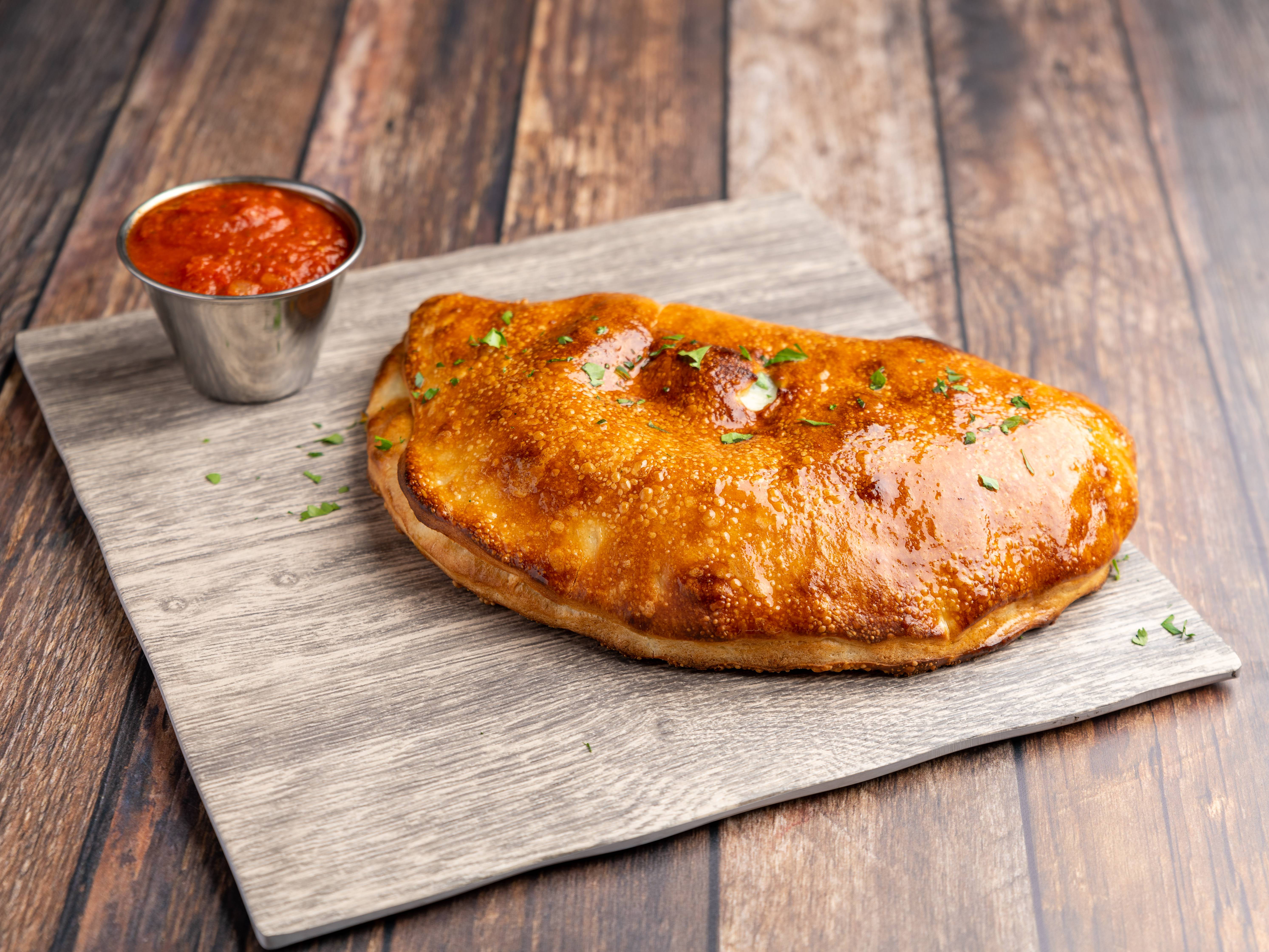 Order Spinach Calzone food online from Legends of Aurora Sports Grill store, Aurora on bringmethat.com