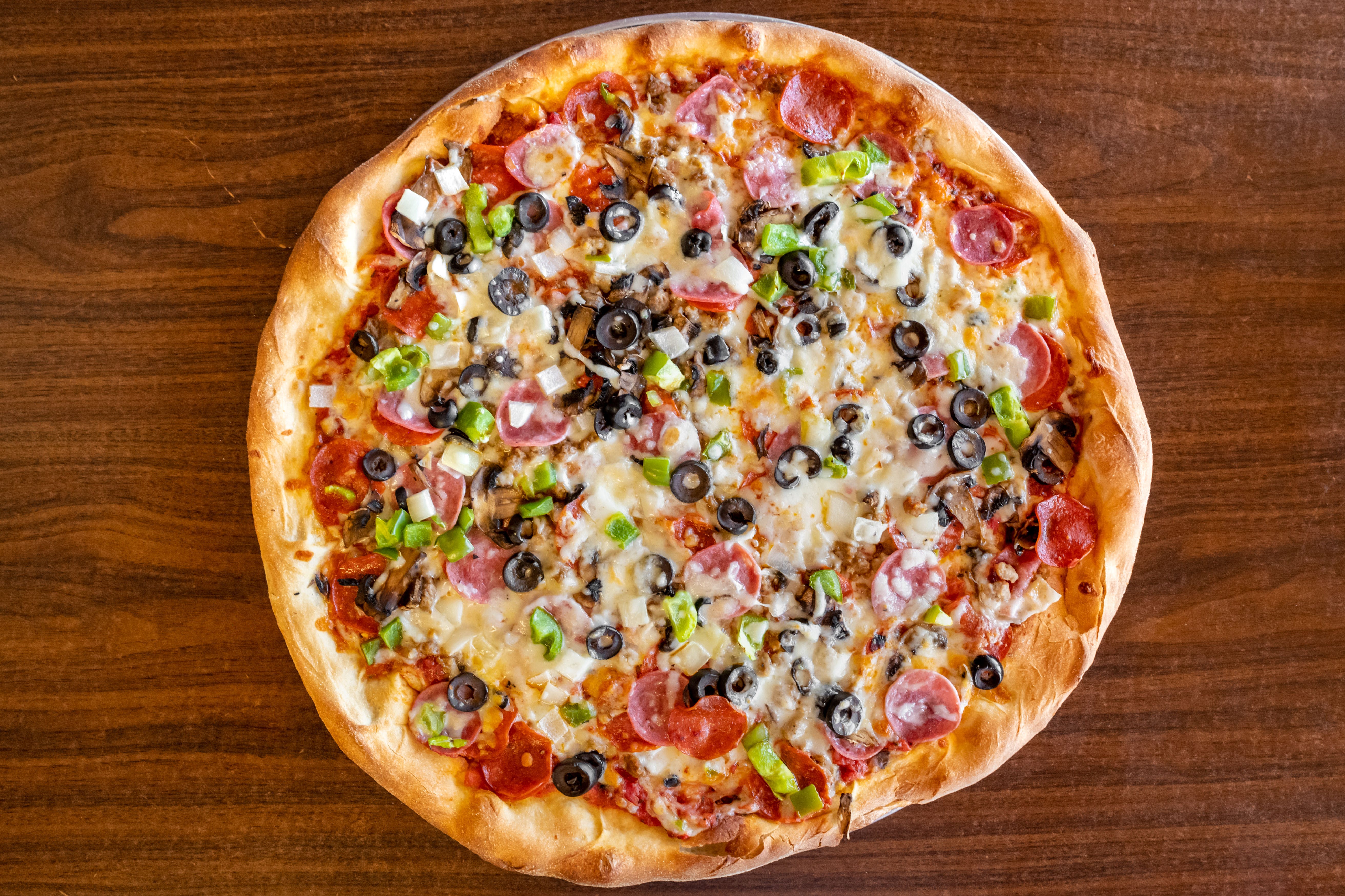Order The Works Slice - Slice food online from Alex's Pizza Pasta Subs Granbury store, Granbury on bringmethat.com
