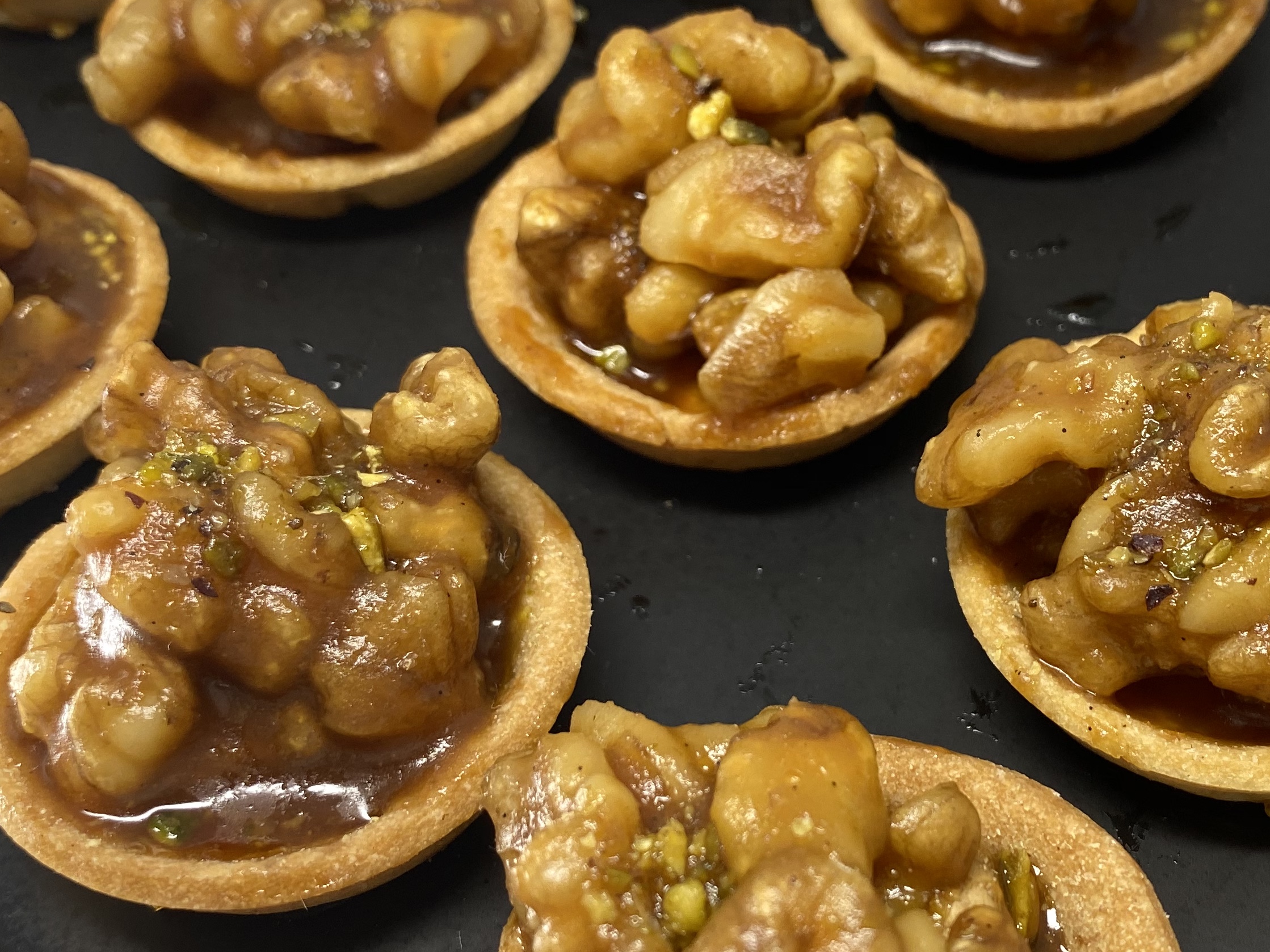 Order Mini Caramel Tart with Nuts  food online from Astoria Bakery & Cafe store, New York on bringmethat.com