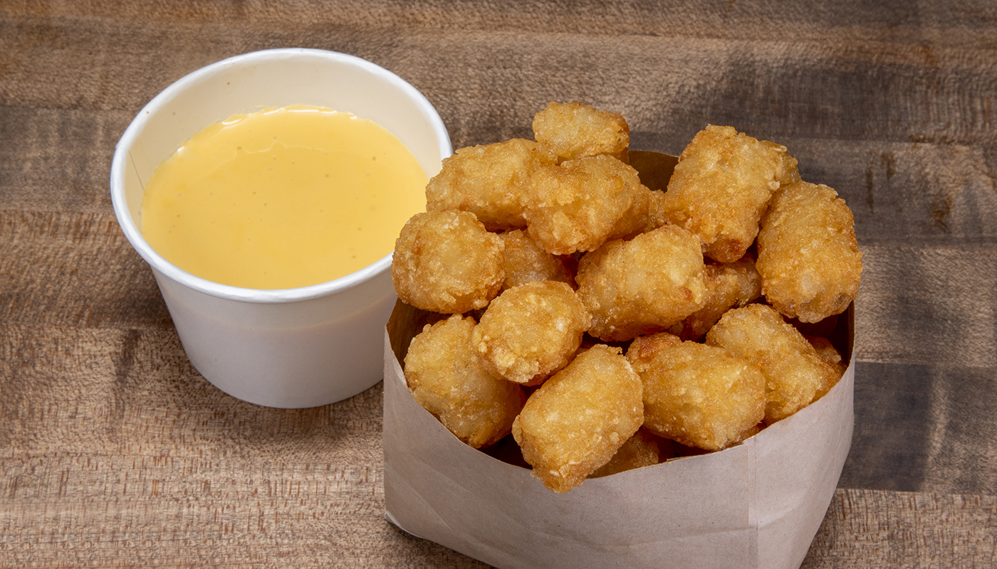 Order CHEESE TOTS food online from Dog Haus store, Bethesda on bringmethat.com