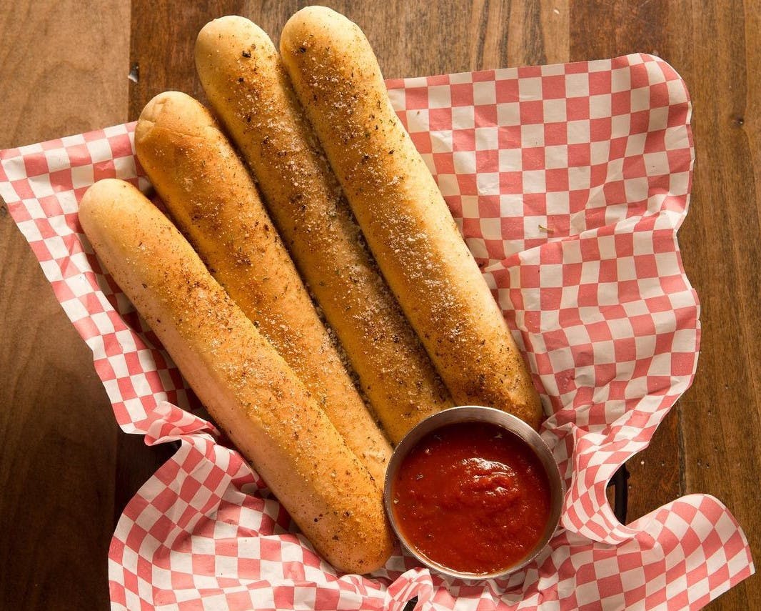 Order Soft Bread Sticks - 4 Pieces food online from Aurelio Pizza store, Fishers on bringmethat.com