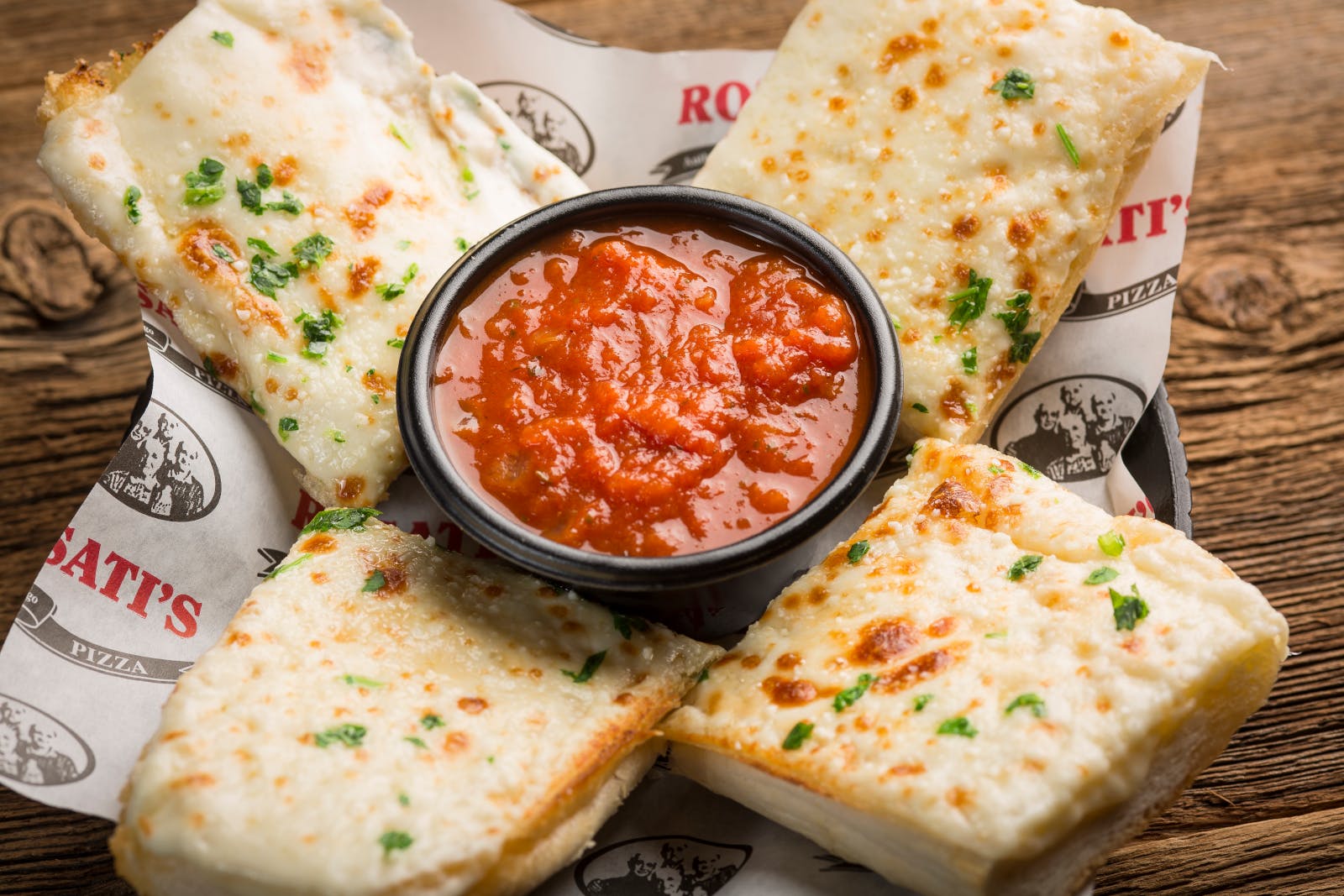 Order Cheesy Garlic Bread - Appetizer food online from Rosatis Pizza store, Bloomington on bringmethat.com