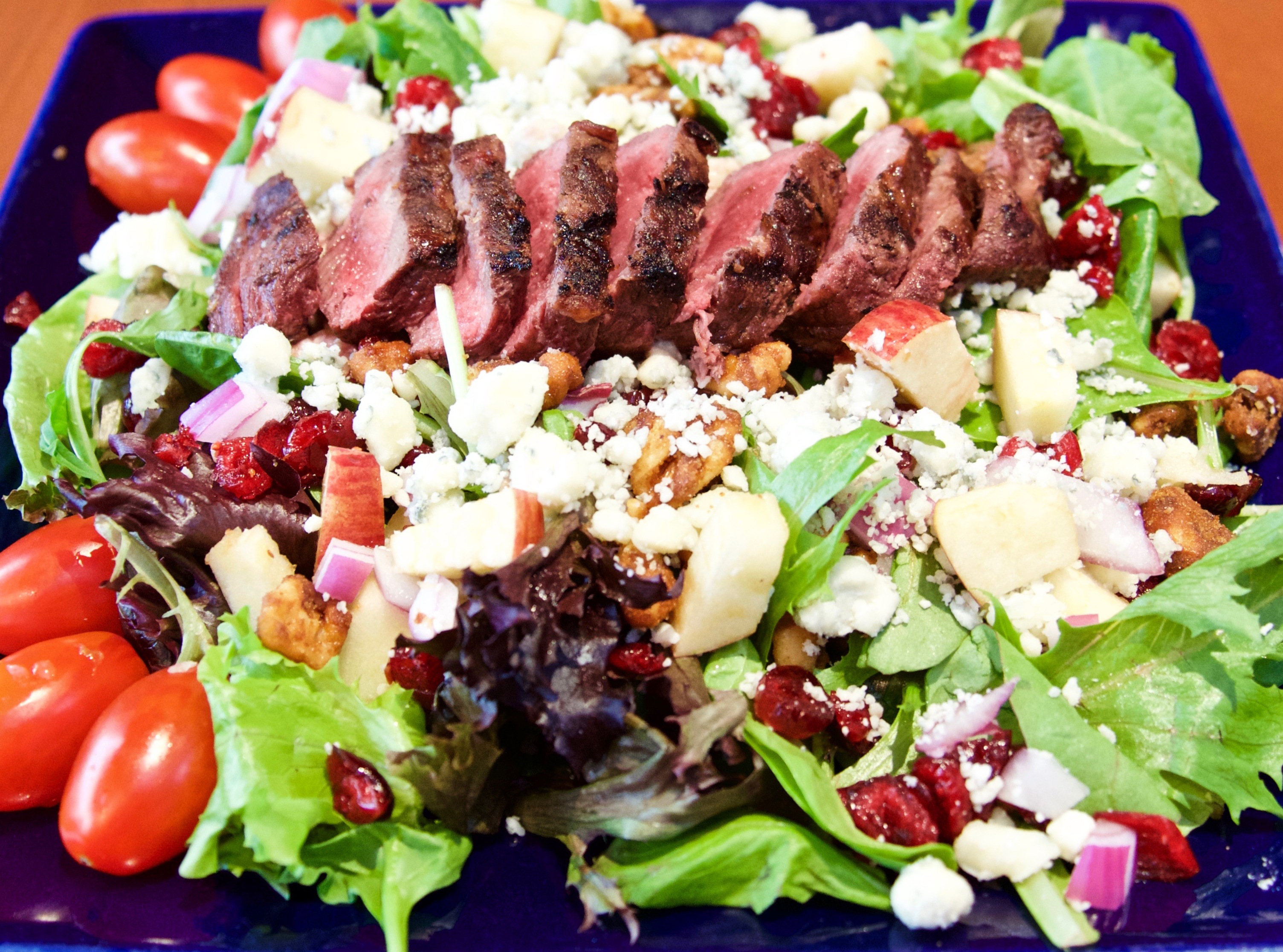 Order Tops Spring Steak Salad food online from Tops American Grill, Bakery, & Bar store, Schenectady on bringmethat.com
