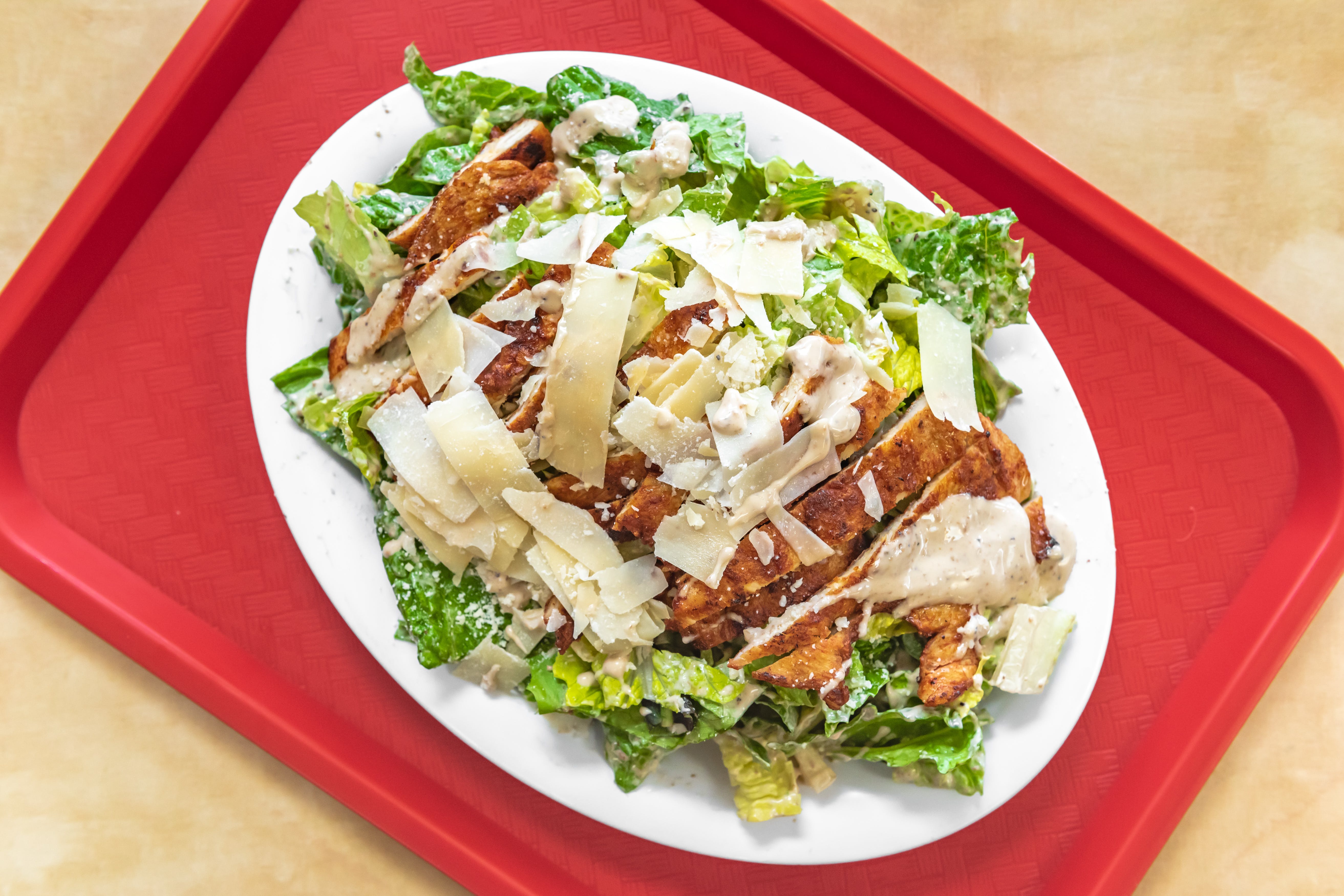 Order Caesar Salad - Salad food online from Bambino's Pizza & Pasta store, Danbury on bringmethat.com