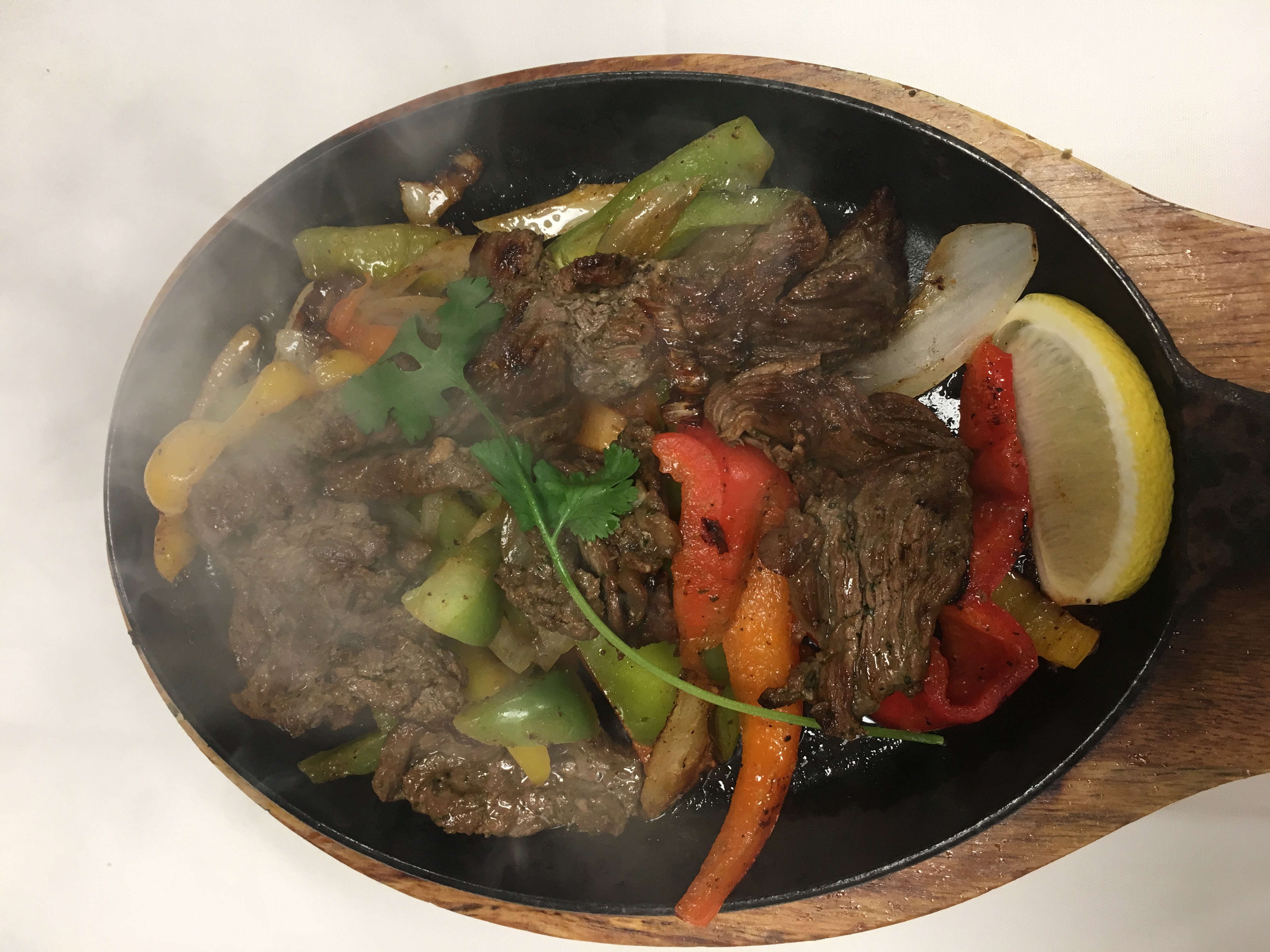 Order Fajitas food online from Mauricio Grill & Cantina store, Bakersfield on bringmethat.com