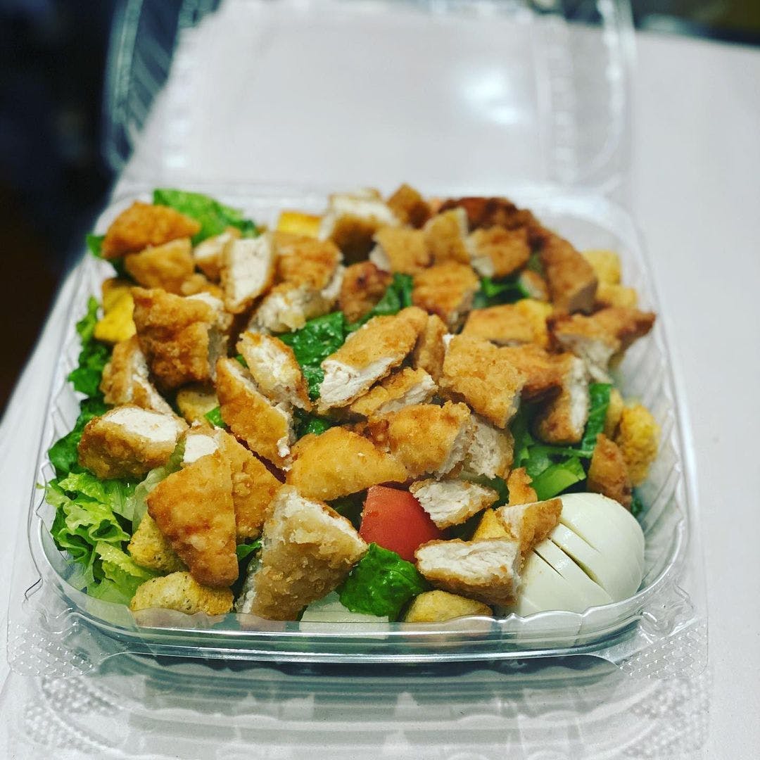 Order Chicken Tender Caesar Salad - Salad food online from Shef's Pizza & Deli store, Philadelphia on bringmethat.com