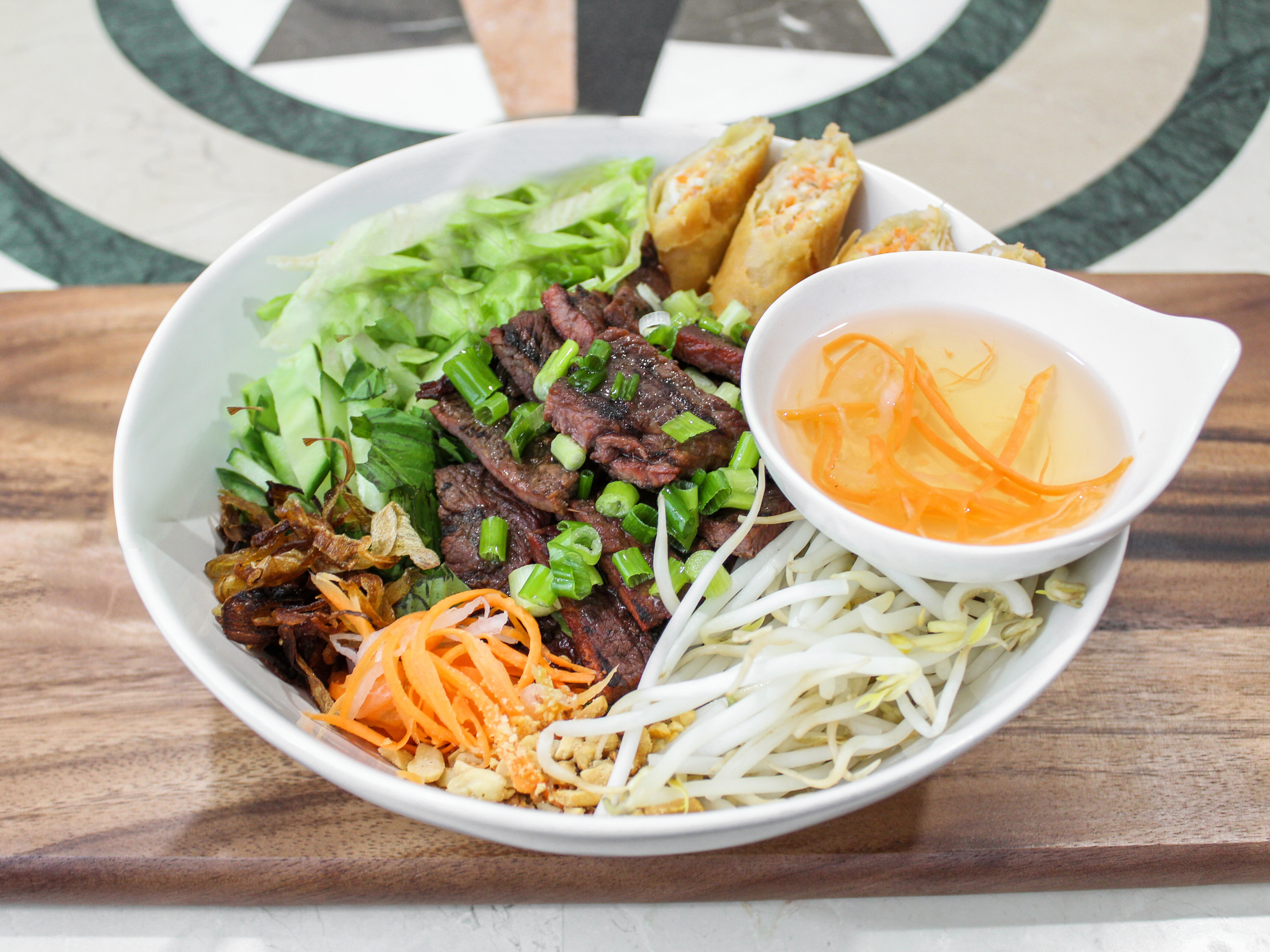 Order Vietnam salad noodles bowl (+2 eggrolls)   food online from Pho Happiness store, Chapel Hill on bringmethat.com