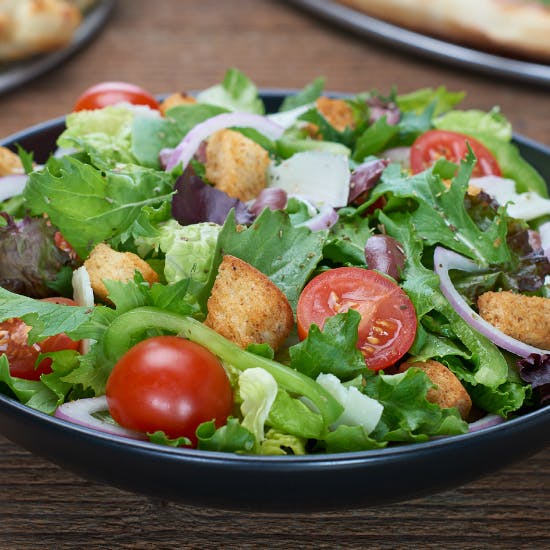 Order Garden Salad - Side food online from Flippin Pizza store, Bethesda on bringmethat.com