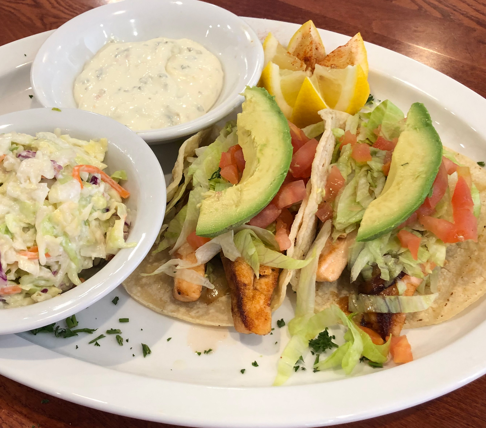 Order 2 Fish Tacos (Salmon) food online from Pinocchio In The Desert store, Palm Springs on bringmethat.com
