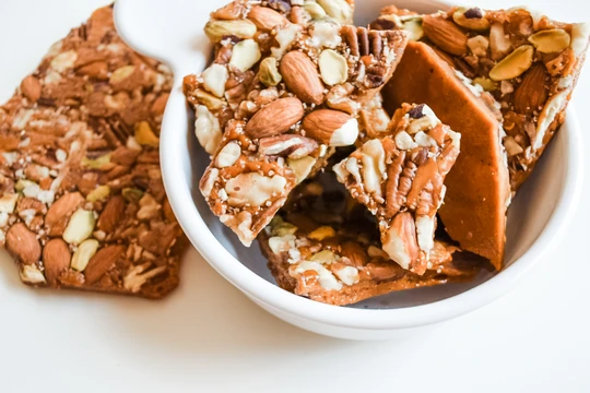 Order Texas Spiced Nut Brittle Large food online from Fort Worth Fudge And Toffee store, White Settlement on bringmethat.com