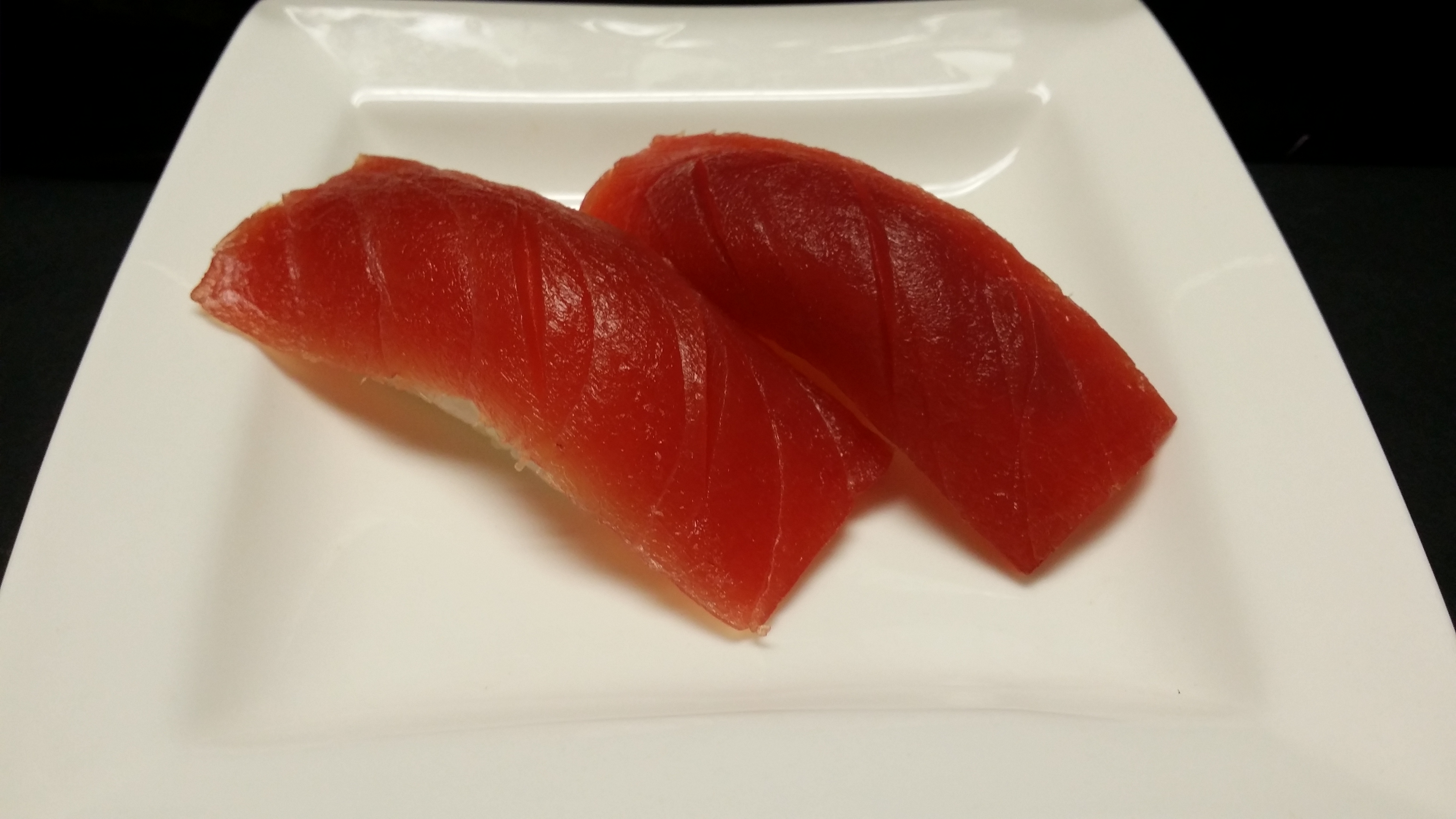 Order 2 Pieces Maguro Nigiri food online from Sushi Lover store, Belmont on bringmethat.com