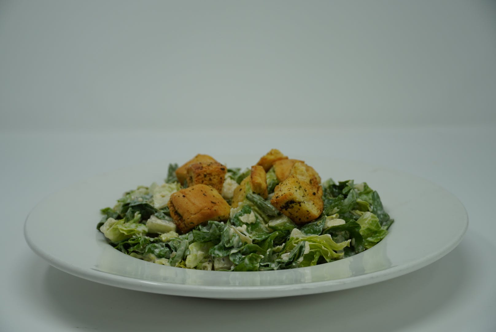 Order Chicken Caesar Salad - Salad food online from DeNunzio's Italian Restaurant - Latrobe store, Latrobe on bringmethat.com