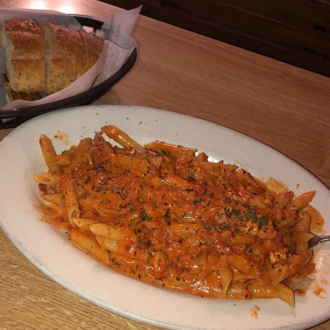 Order Penne Alla Vodka Sauce - Pasta food online from Mario's Pizza and Restrnt store, White Plains on bringmethat.com