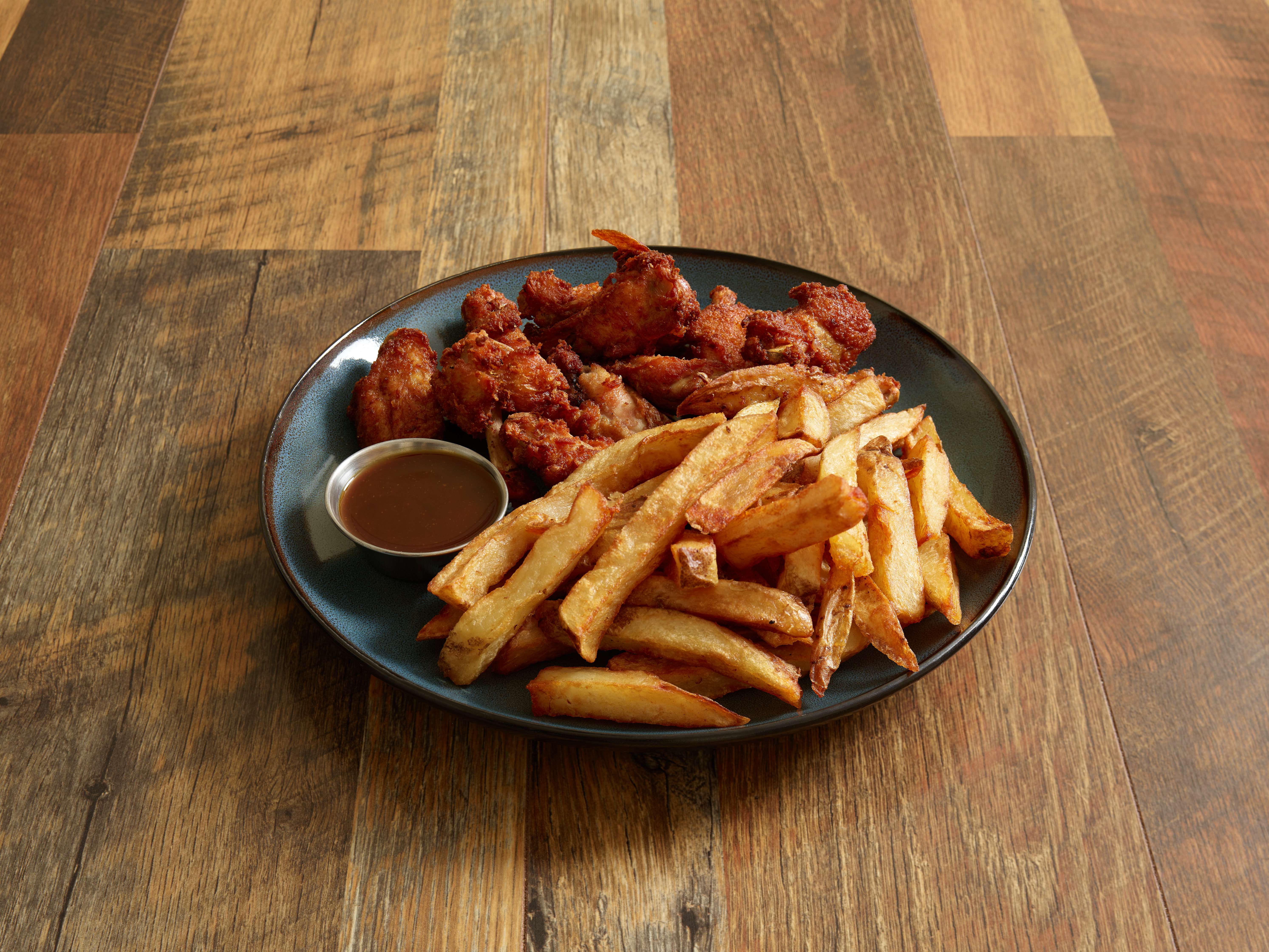 Order 10 Piece Chicken Wings  food online from The Fish & Chip store, South Burlington on bringmethat.com
