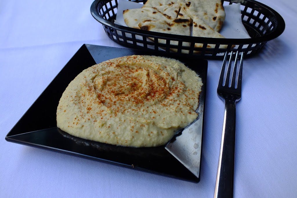 Order Homemade Hummus - 8 oz. food online from Giovanni's Pizza store, Pittsburgh on bringmethat.com