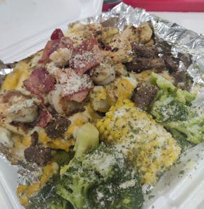 Order Loaded Potato with Three Proteins food online from The Food Station store, Toledo on bringmethat.com