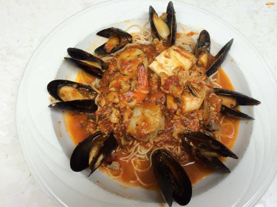 Order Mussels Bianco - Appetizer food online from Nonna's store, Lillington on bringmethat.com