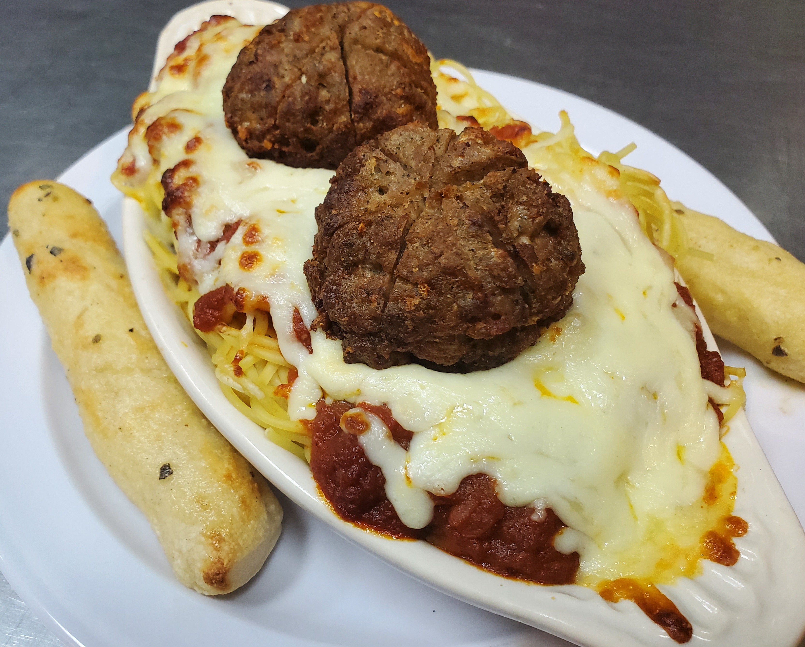 Order Baked Pasta Marinara or Baked Pasta Meatball and Soft Drink food online from Greek's Pizzeria store, Muncie on bringmethat.com