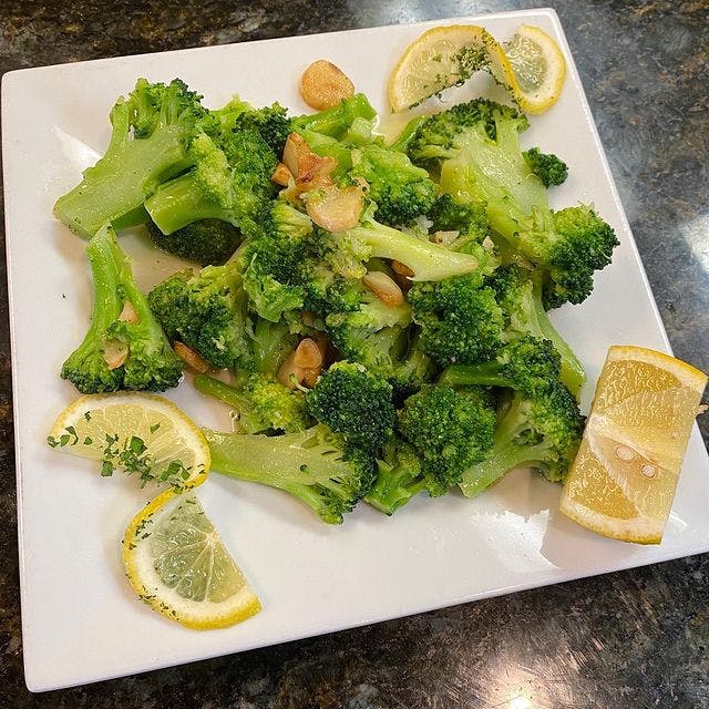 Order Sauteed Broccoli - Side food online from Cafe Amici store, South Brunswick on bringmethat.com