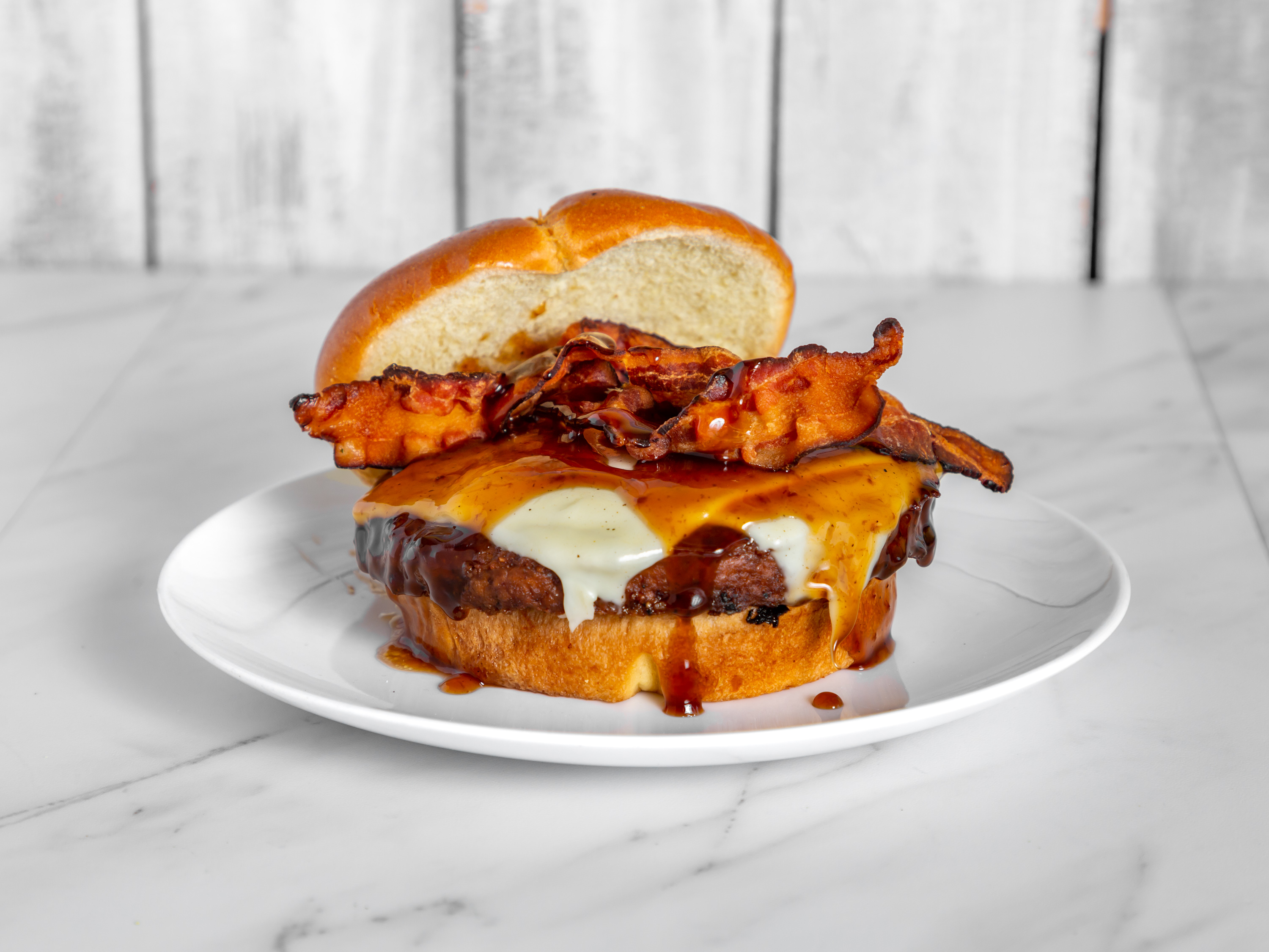 Order 1/2 LB Sweet Whisky Bourbon Burger  (Today for $10.00) food online from Burger Guys store, Kansas City on bringmethat.com