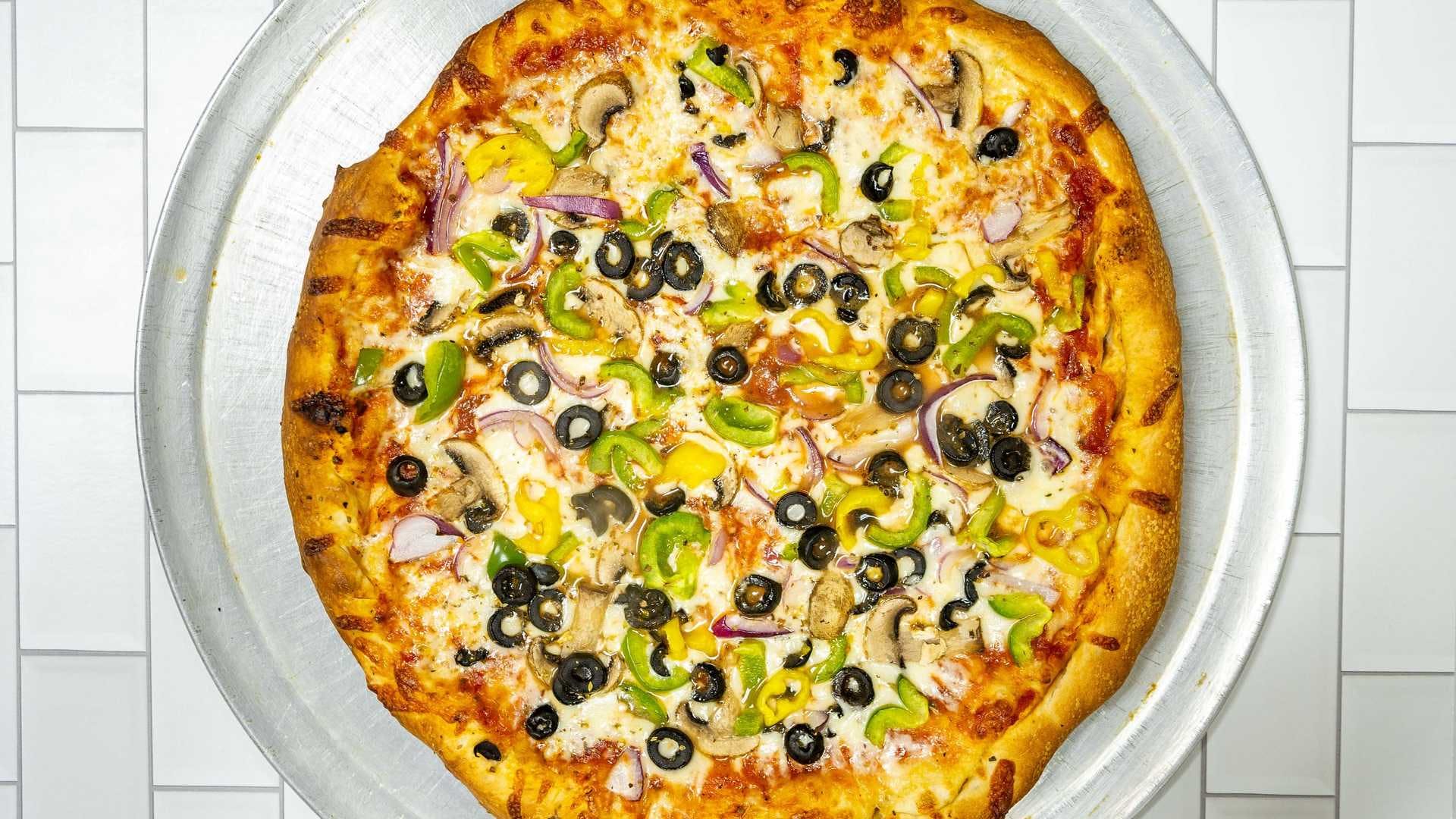 Order Round Veggie Pizza - Large (8 Pieces) food online from Original Buscemi store, Troy on bringmethat.com