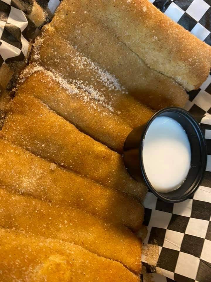 Order Breadsticks - 8 Pieces food online from Pizza Mia store, Lock Haven on bringmethat.com