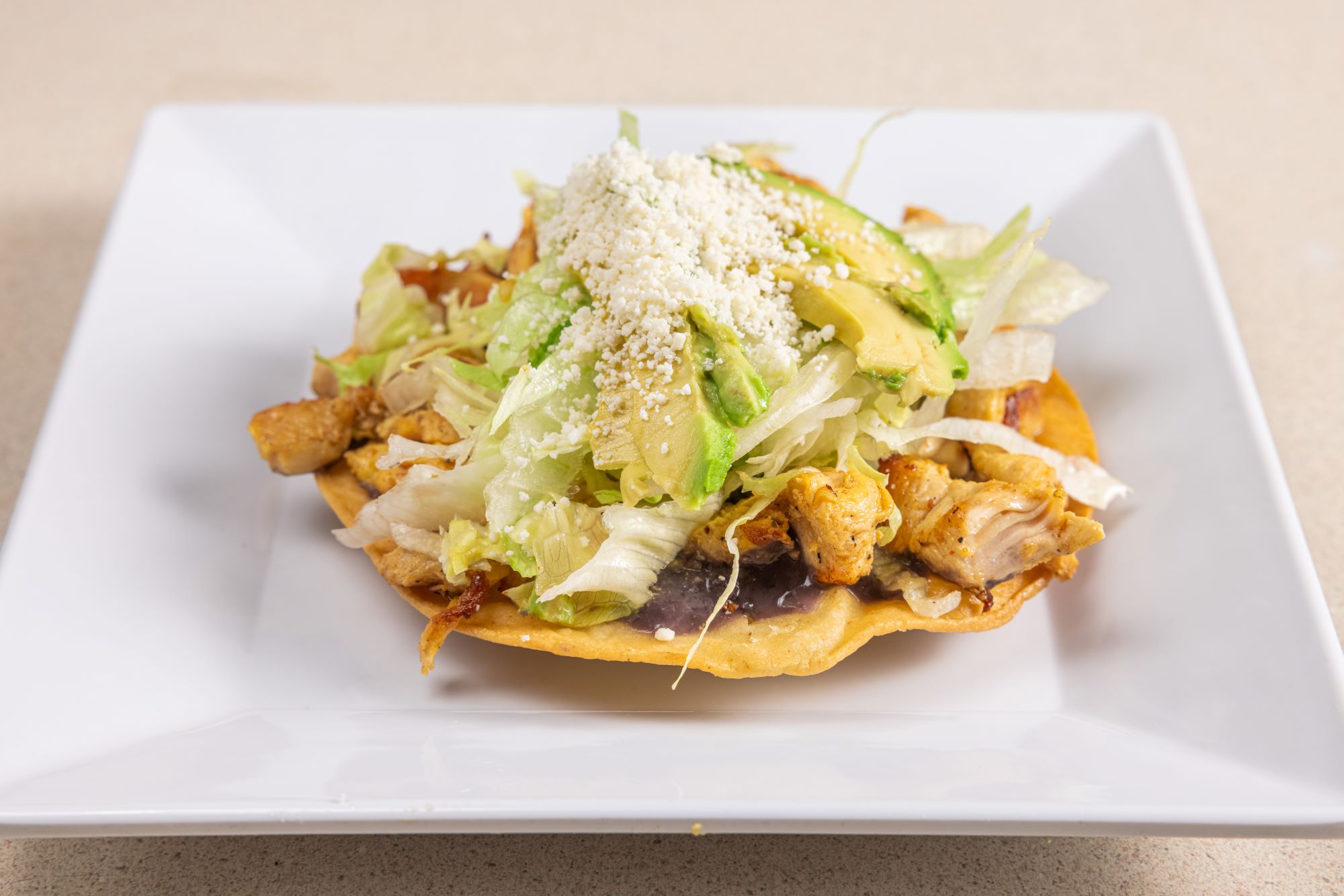 Order Chicken Tostadas  food online from Homemade Taqueria store, Brooklyn on bringmethat.com