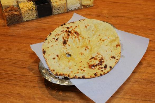 Order Roti food online from Marigold Maison Indian Cuisine store, Phoenix on bringmethat.com