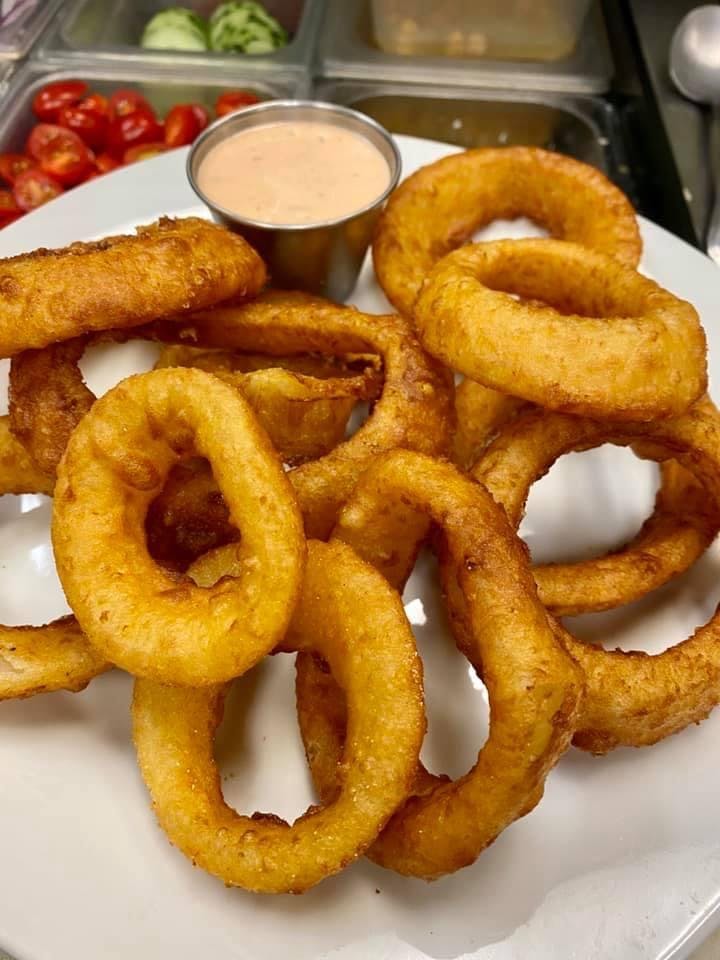 Order Beer Battered Onion Rings - Onion Rings food online from Pizza Mia store, Grand Blanc on bringmethat.com