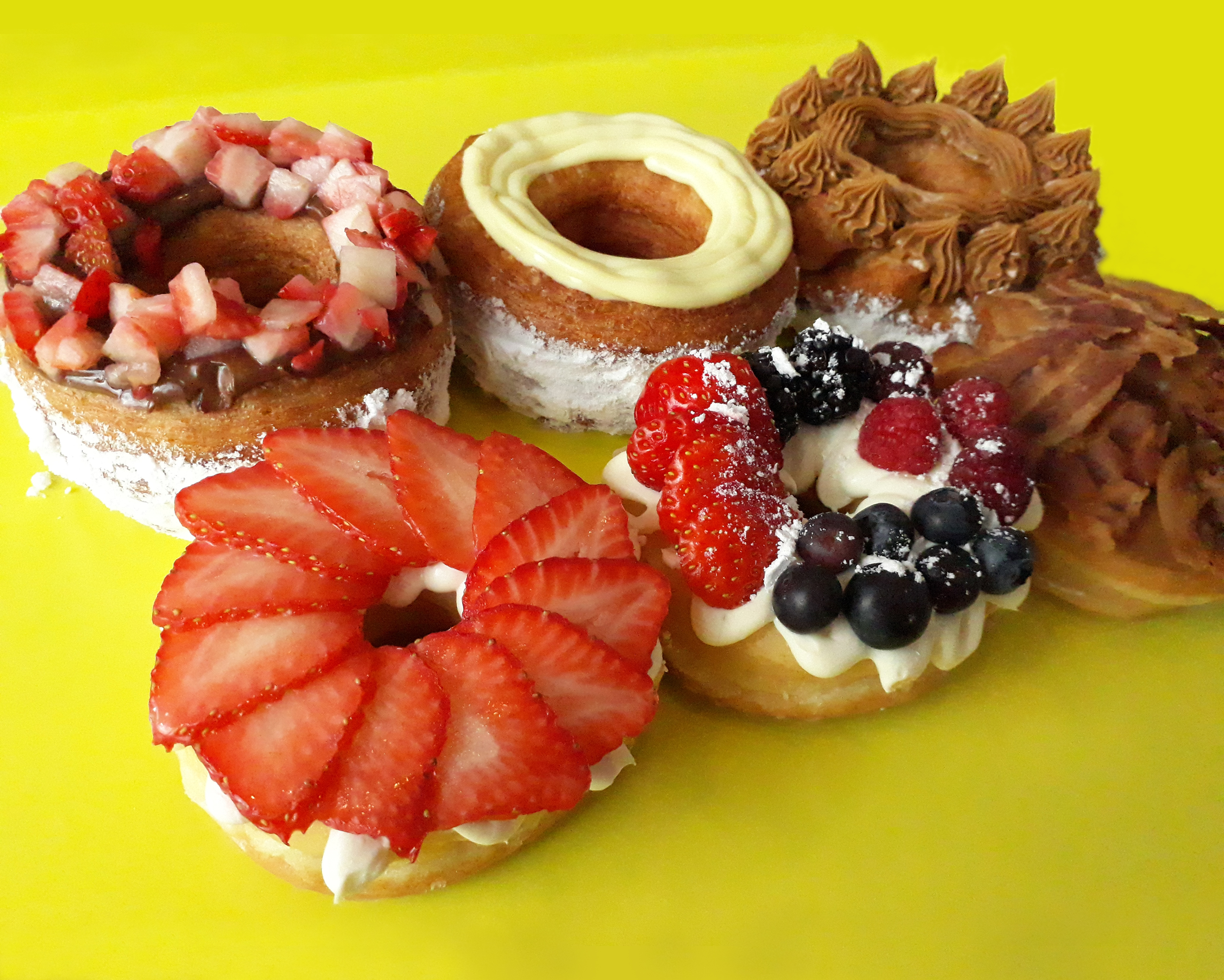 Order 1 Dozen Mix All Specialties Donut food online from Jaram's Donuts store, Dallas on bringmethat.com