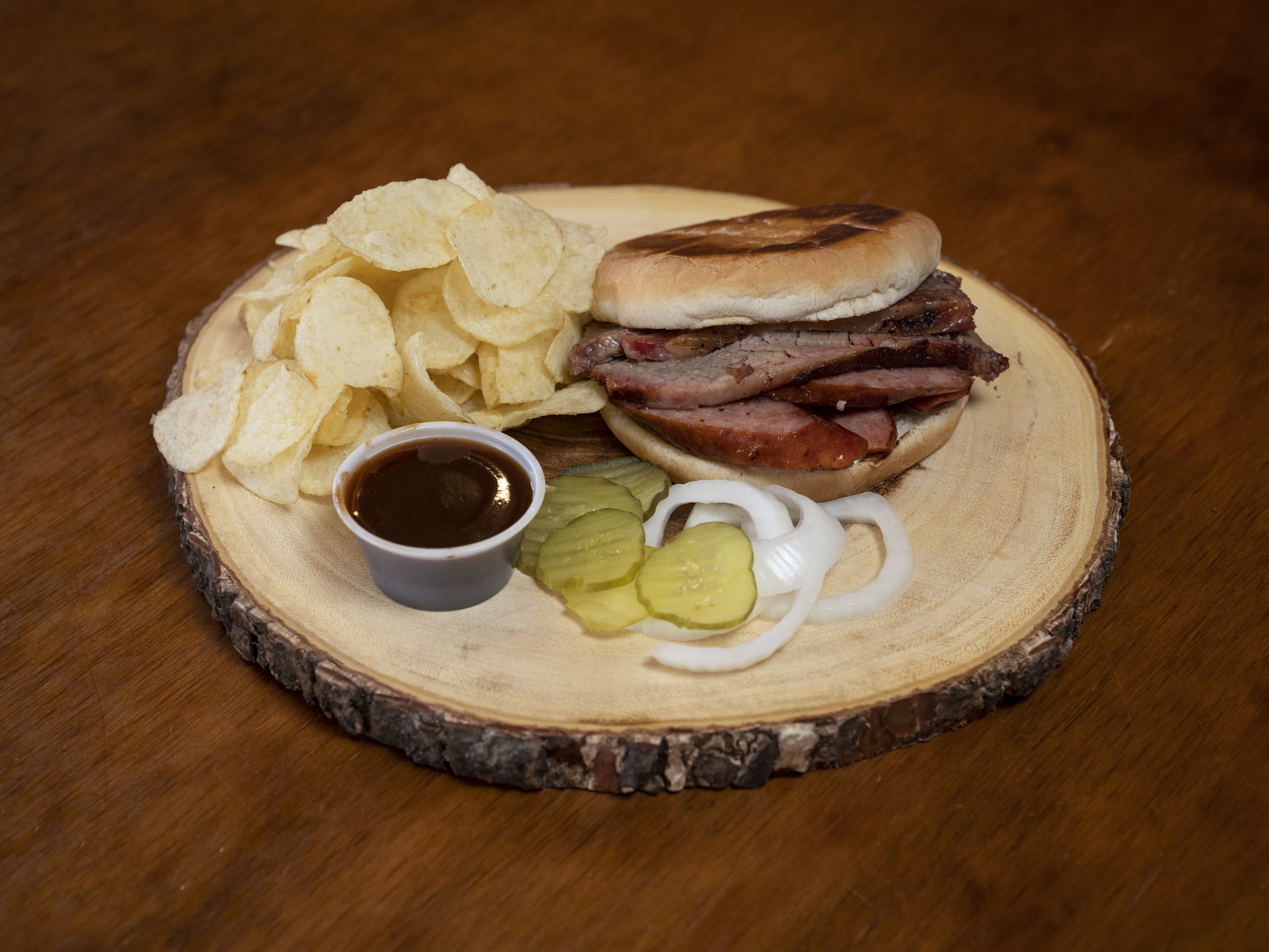Order 4. Brisket and Sausage Sandwich food online from Briskets & Beer Smokehouse store, Laredo on bringmethat.com