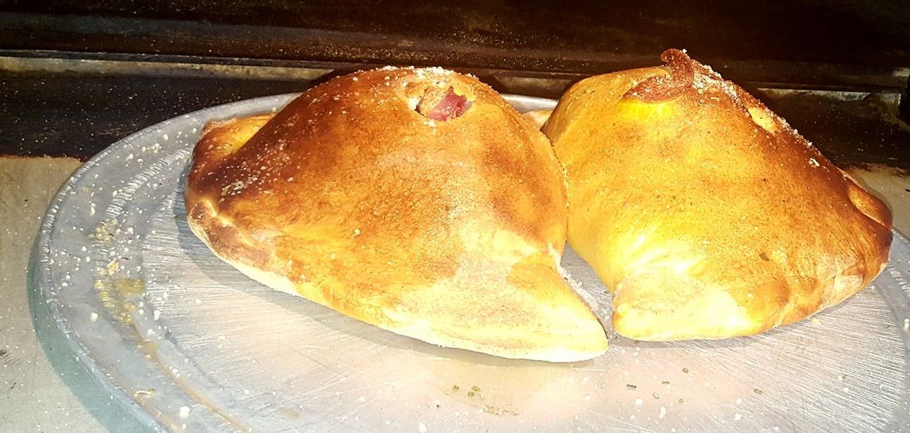 Order Ham Calzone - Calzone food online from Jack's Brick Oven Pizzeria Restaurant store, Norwich on bringmethat.com