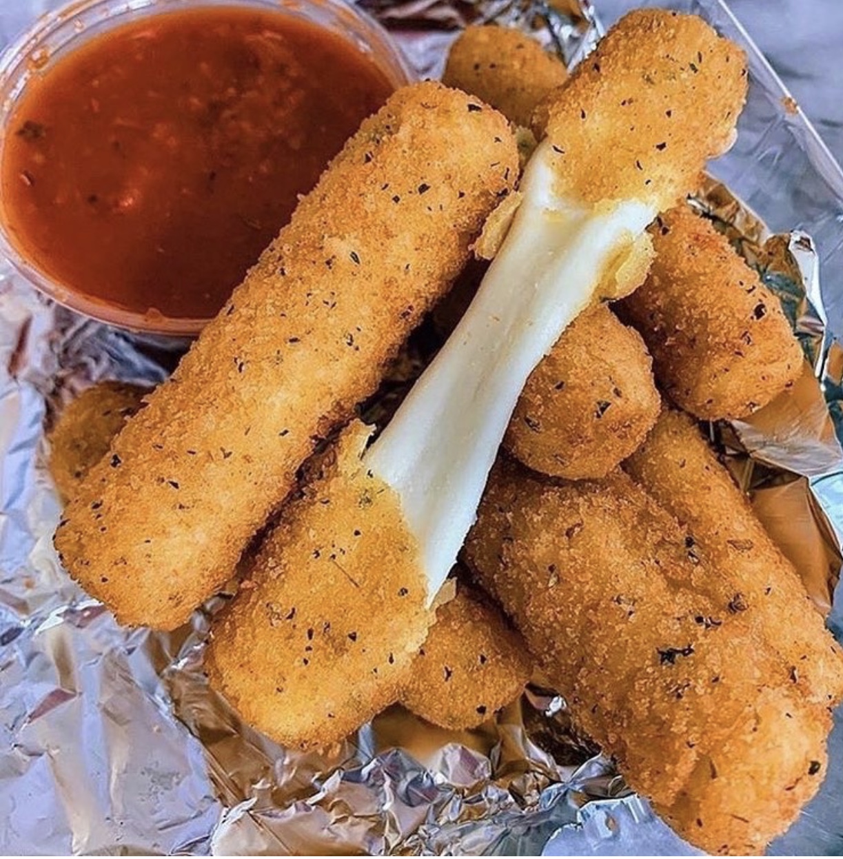 Order 6 Piece Mozzarella Sticks food online from Michelangelo's Deep Dish And Calzones store, San Francisco on bringmethat.com