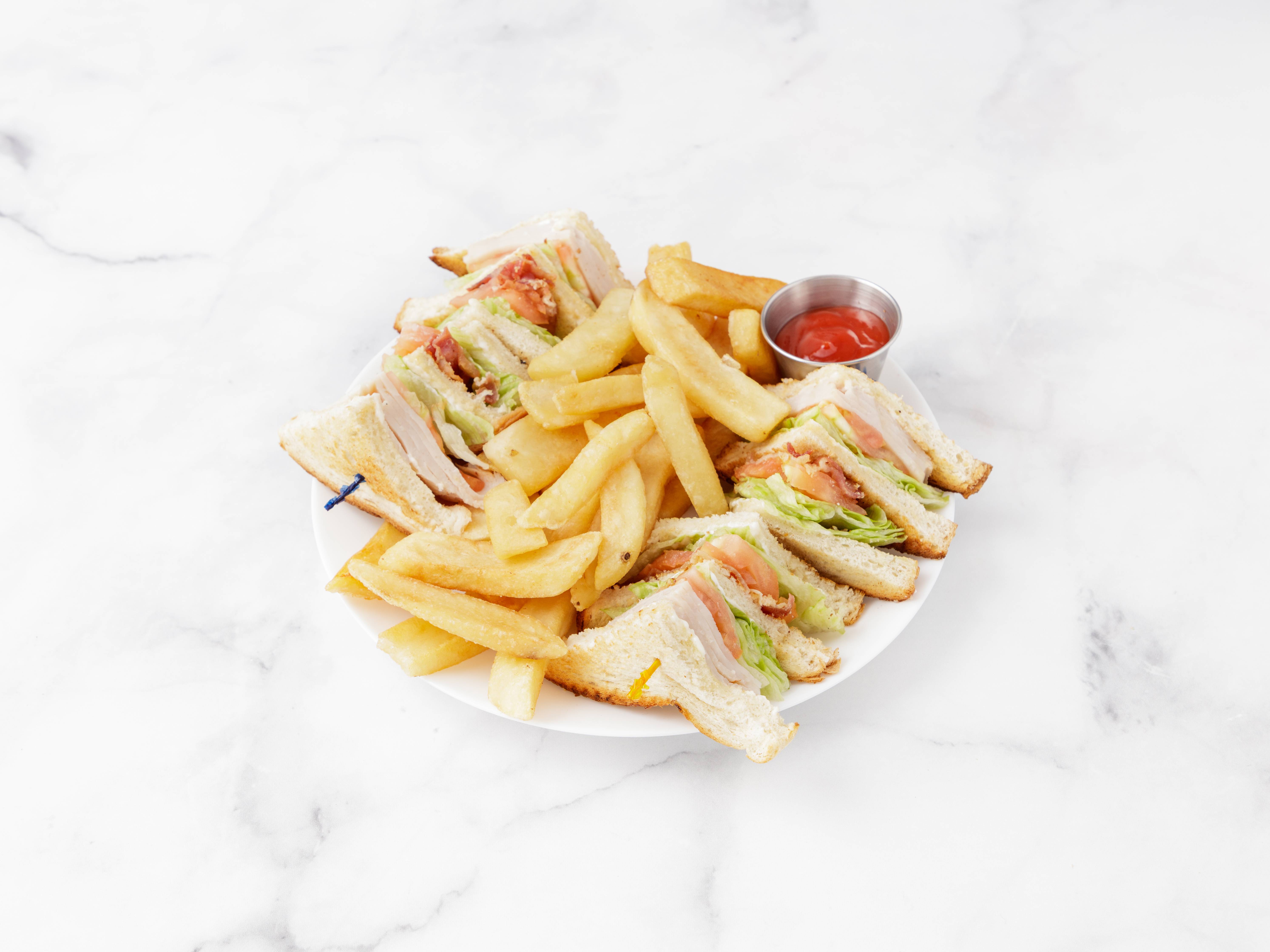 Order Turkey Club Sandwich food online from More Than Pizza store, New Haven on bringmethat.com