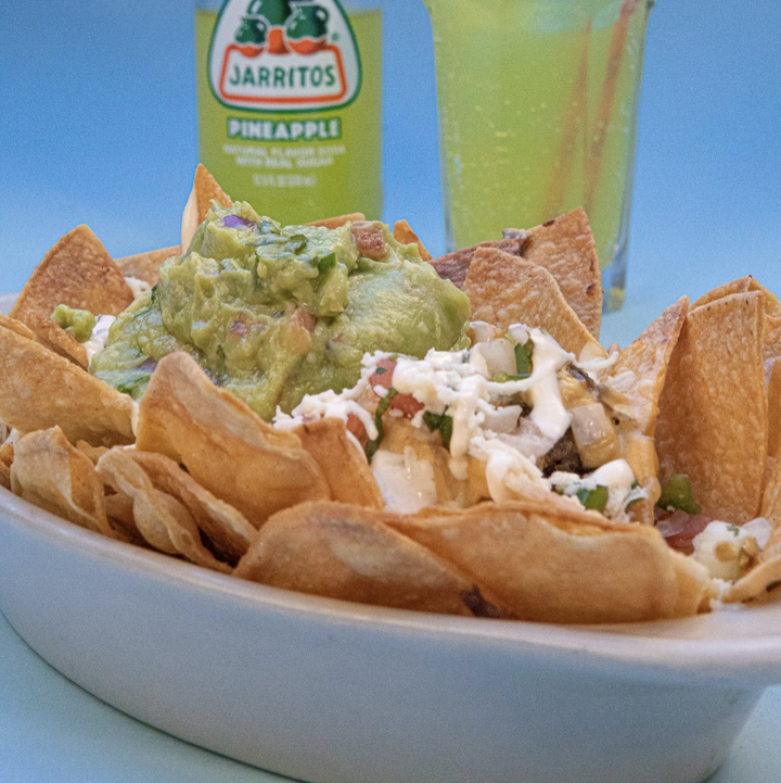 Order Nachos food online from Coppelia store, New York on bringmethat.com